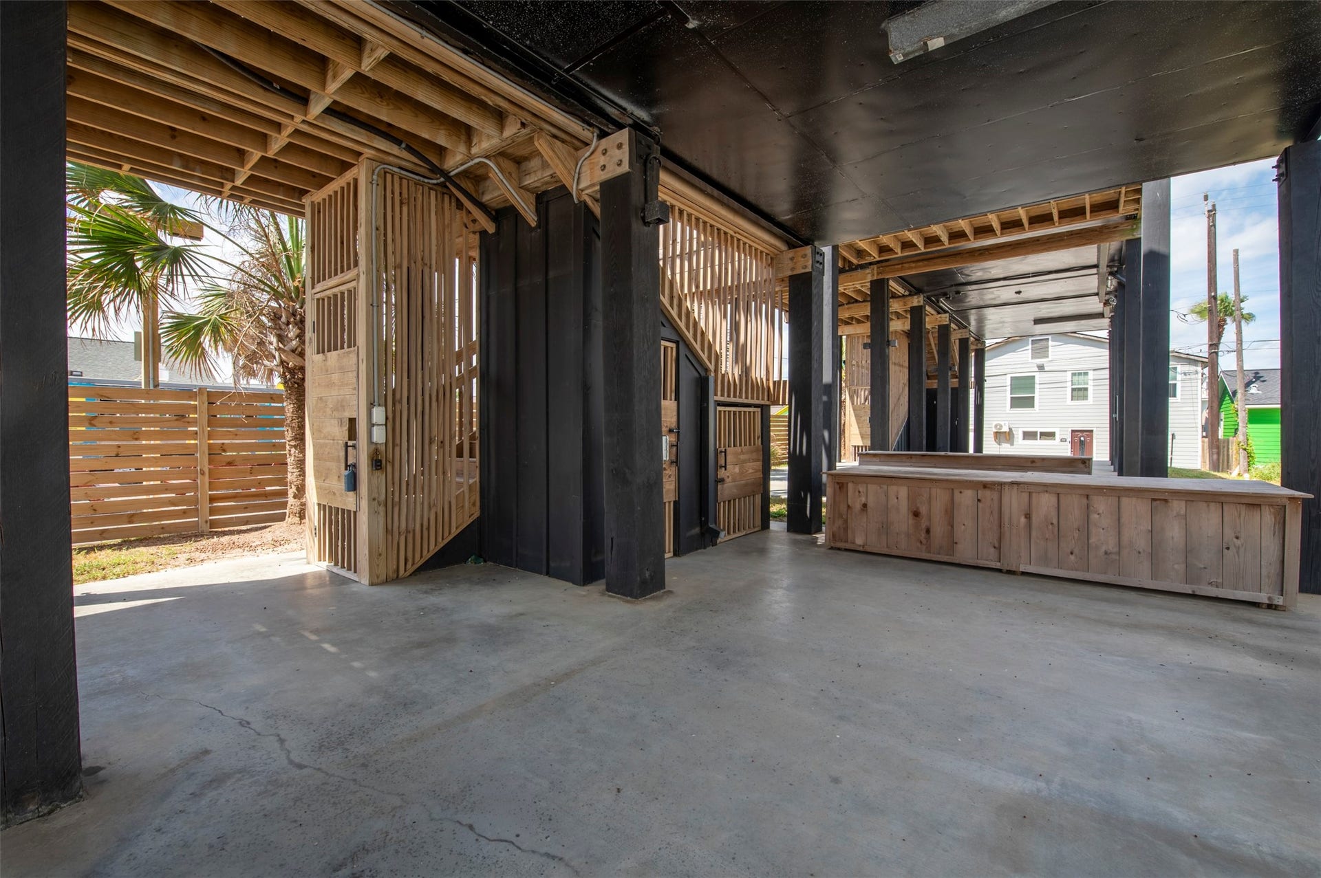 2906 Avenue R 1/2, Galveston, TX 77550 Front house private gated stairwell and private outdoor shower.