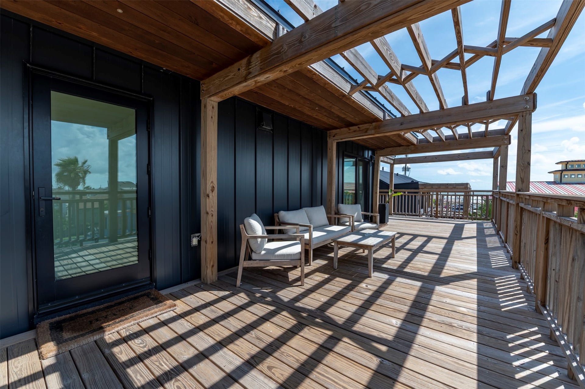 2906 Avenue R 1/2, Galveston, TX 77550 Back house upstairs deck with pergolas with and seating