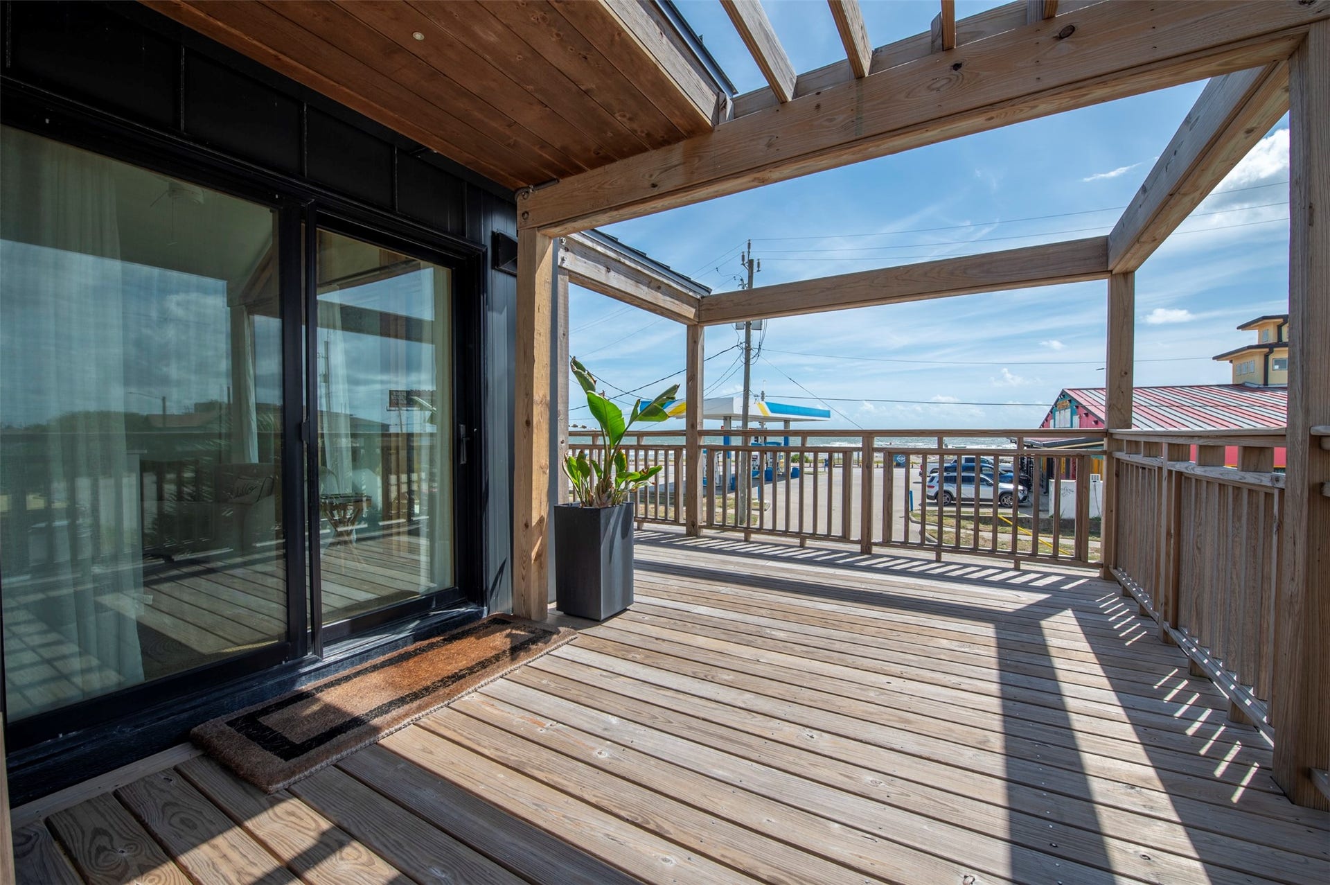 2906 Avenue R 1/2, Galveston, TX 77550 Front house deck view from seating area