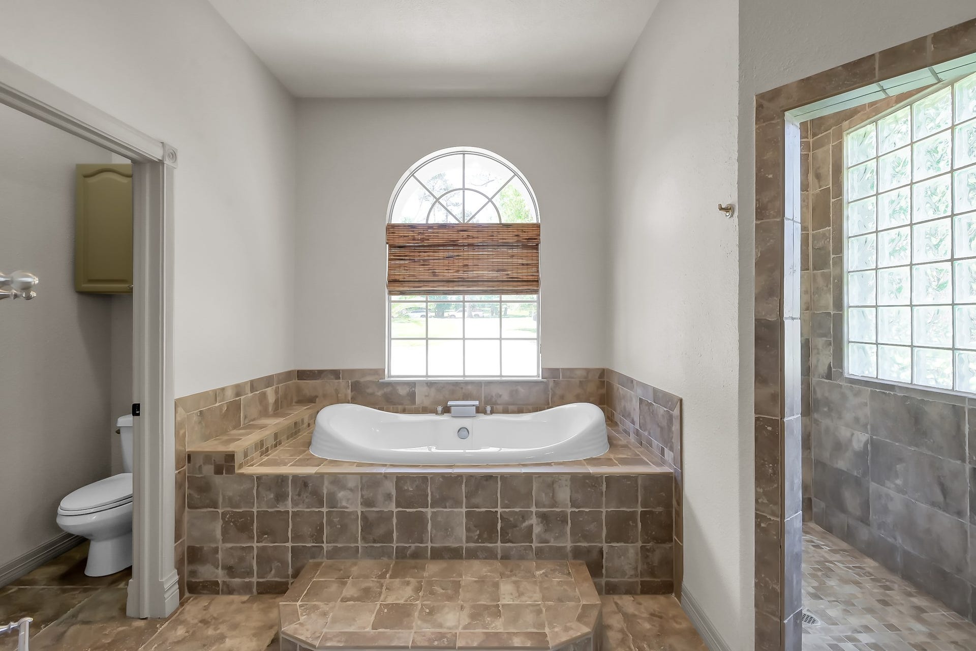 12758 Aries Loop Loop, Willis, TX 77318 Primary Bathroom has Walk in Shower and Soaking Tub