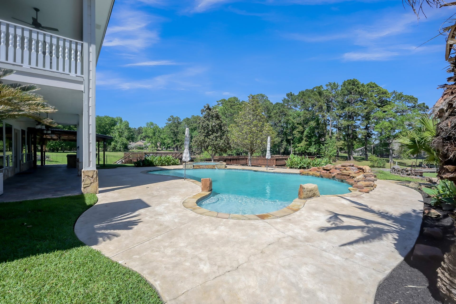 12758 Aries Loop Loop, Willis, TX 77318 Pool has Hot Tub and Waterfall