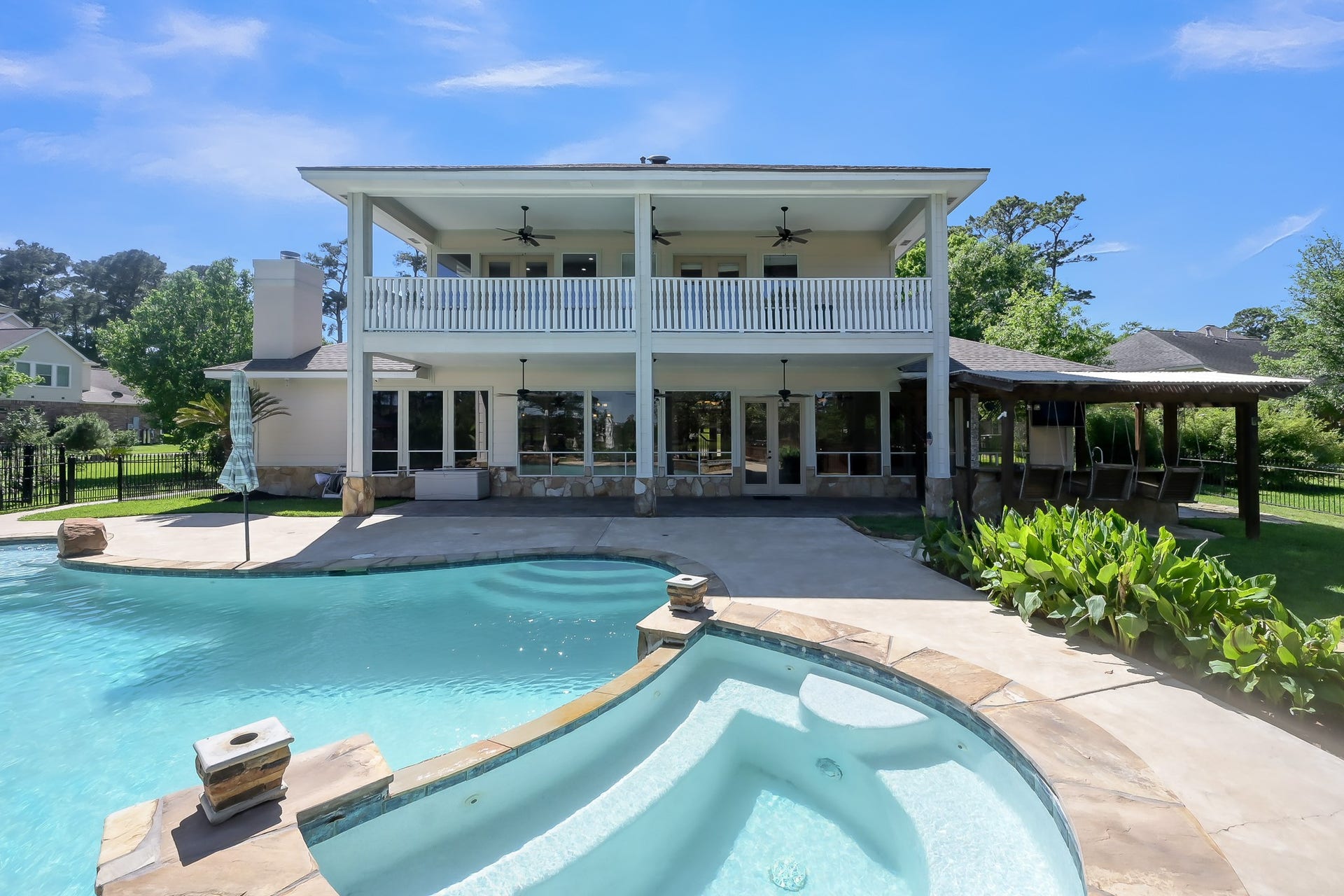 12758 Aries Loop Loop, Willis, TX 77318 Grand Balcony across the back of house and covered patio downstairs