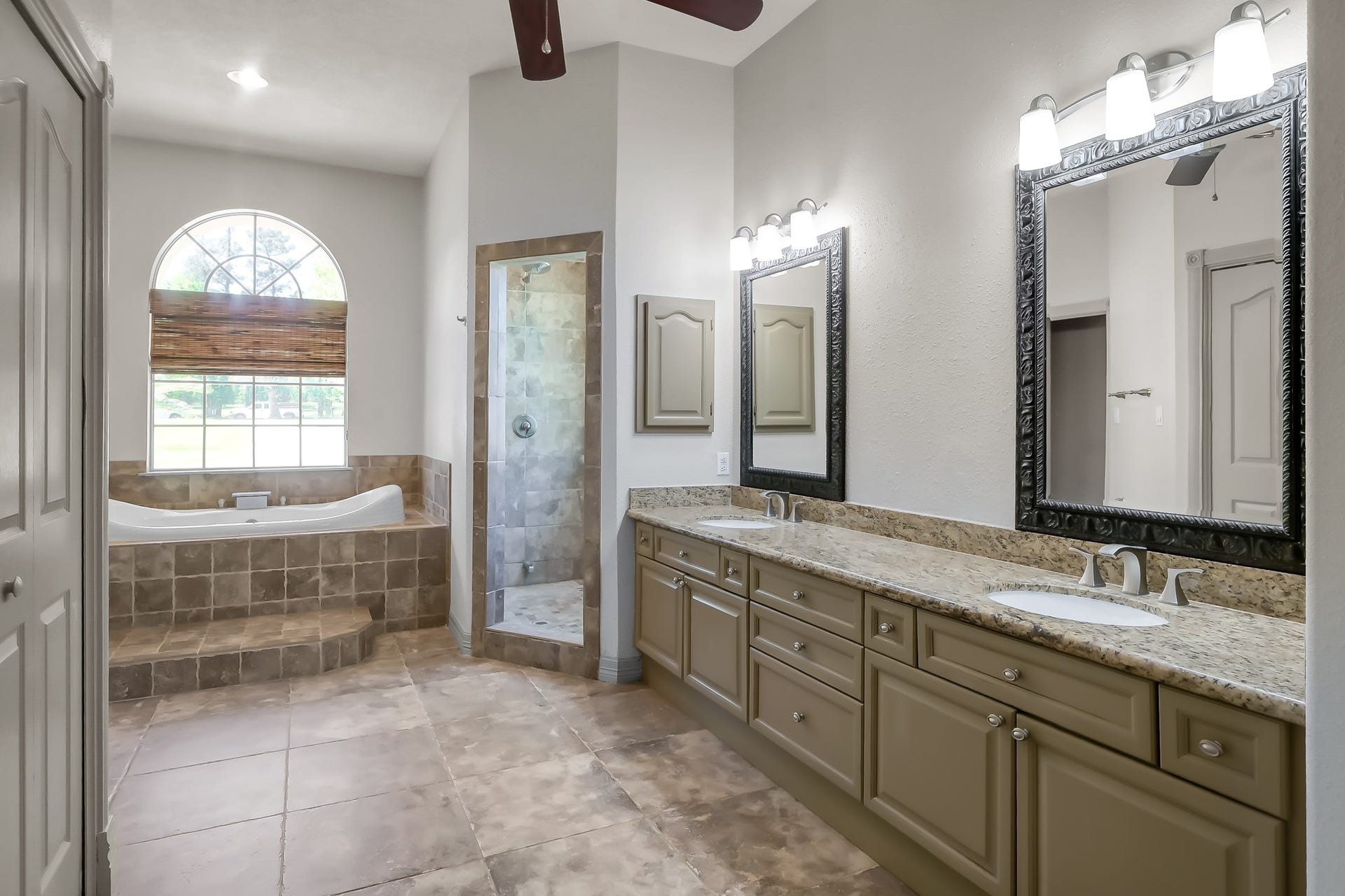 12758 Aries Loop Loop, Willis, TX 77318 Primary Bathroom with lots of Beautiful Cabinetry and Granite Countertops