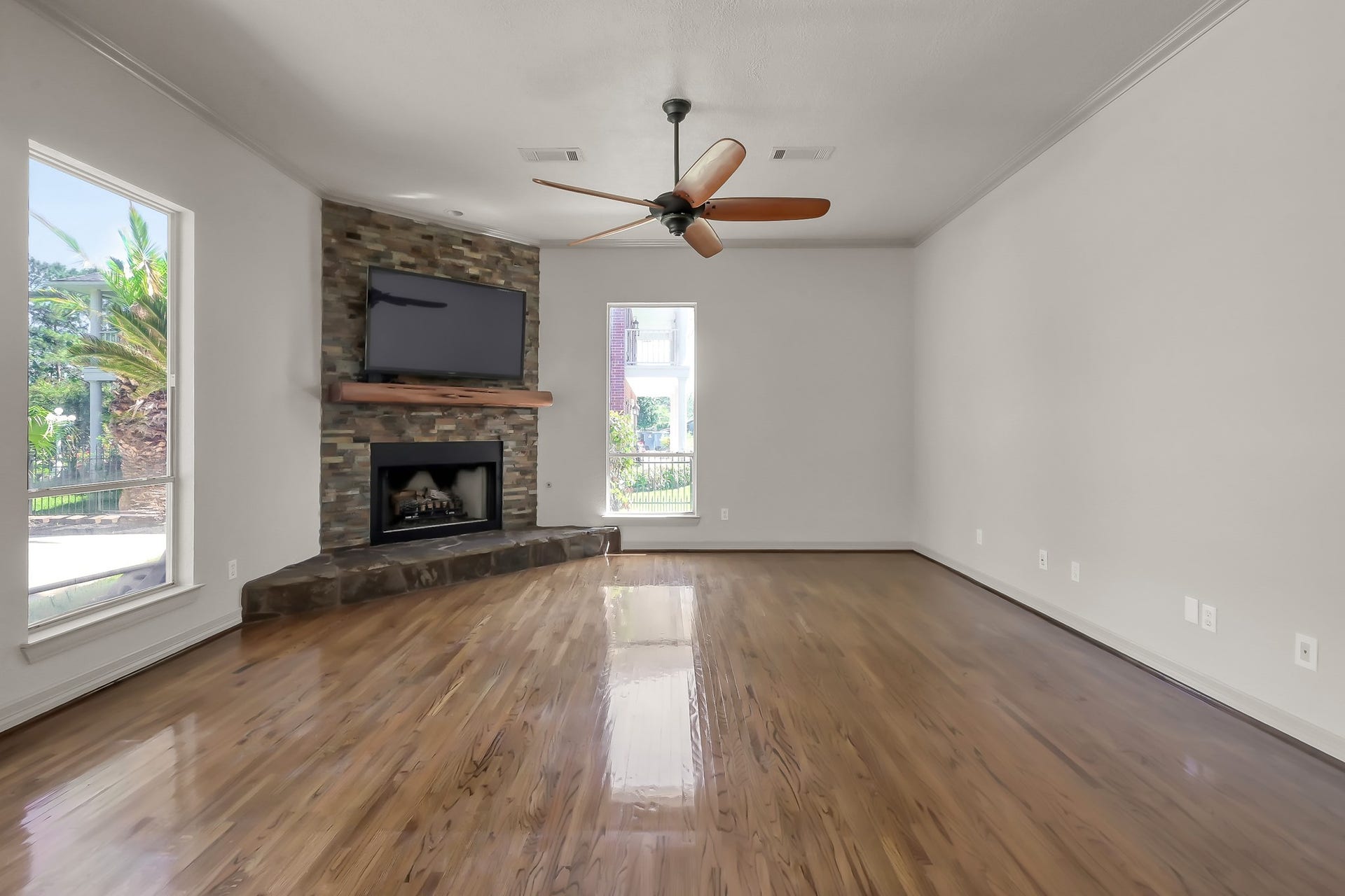 12758 Aries Loop Loop, Willis, TX 77318 Living Area has Beautiful Hardwood Flooring and Gas Log Fireplace