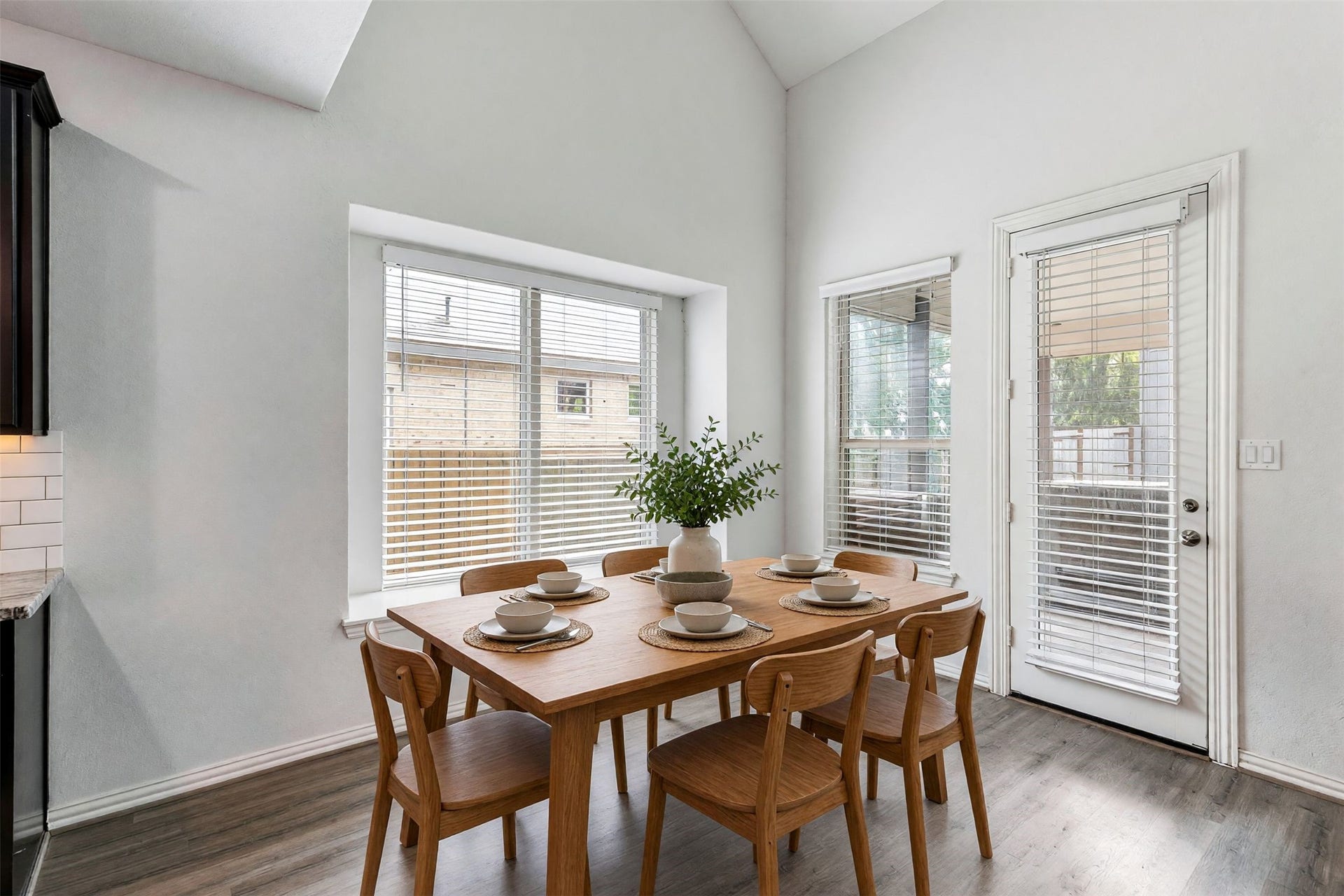 Virtually staged breakfast room.