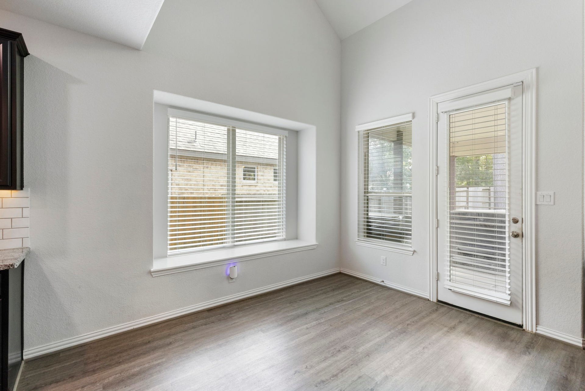 The windows in the breakfast room bring in an abundance of natural light.