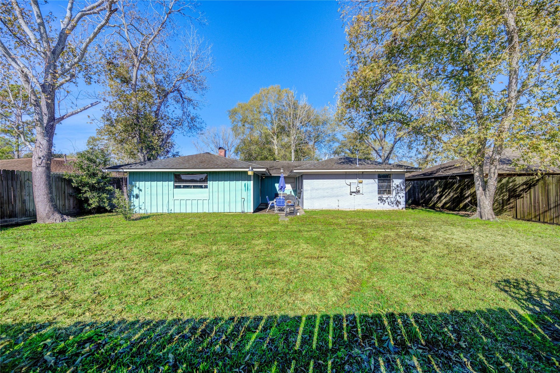 9305 Gettysburg Avenue, Texas City, TX 77591 Ideal for outdoor seating or gatherings, this large backyard is ready for memory-making. Featuring mature pecan trees, and fully fenced yard.