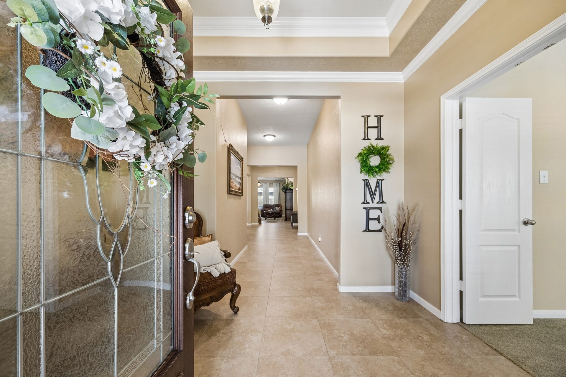 26251 Caper Meadow Lane, Katy, TX 77494 The foyer featured a tray ceiling with crown molding detail, tile floors and to the right of the entry is the Home Flex room which is currently being used as a gym. This room is great for private Study, classroom, craft room, music room or what works best for your family. There is a set of double wooden French doors for complete privacy..