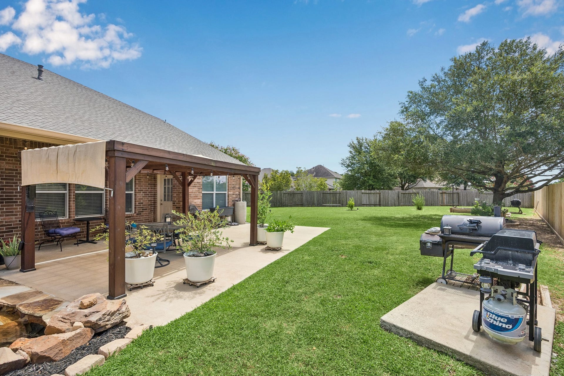 26251 Caper Meadow Lane, Katy, TX 77494 There are many fruit bearing trees and plenty of yard if you ever wanted to add a big pool.