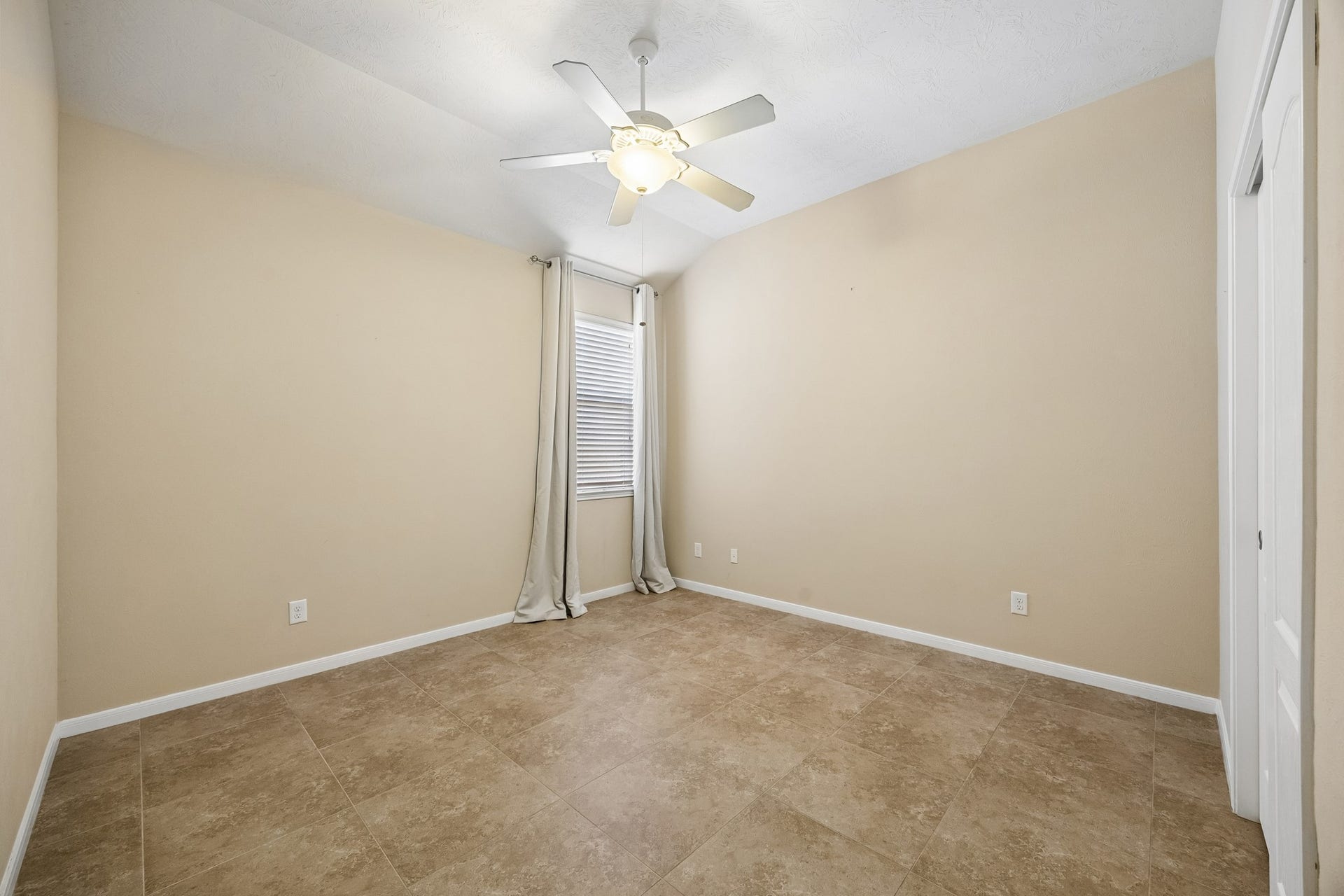 26251 Caper Meadow Lane, Katy, TX 77494 The other secondary bedroom downstairs has tile floors for easy care.