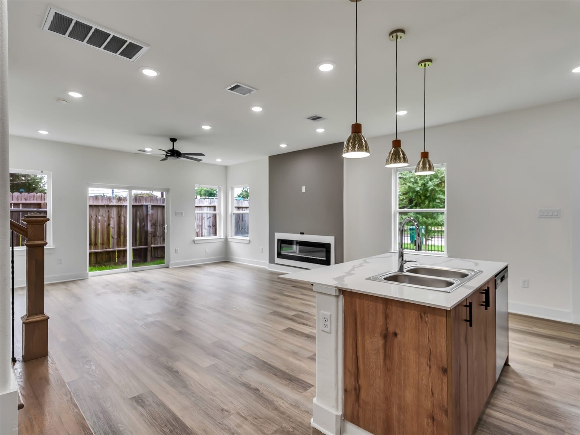 855 S Victory Drive, #C, Houston, TX 77088 Kitchen facing living room & fireplace