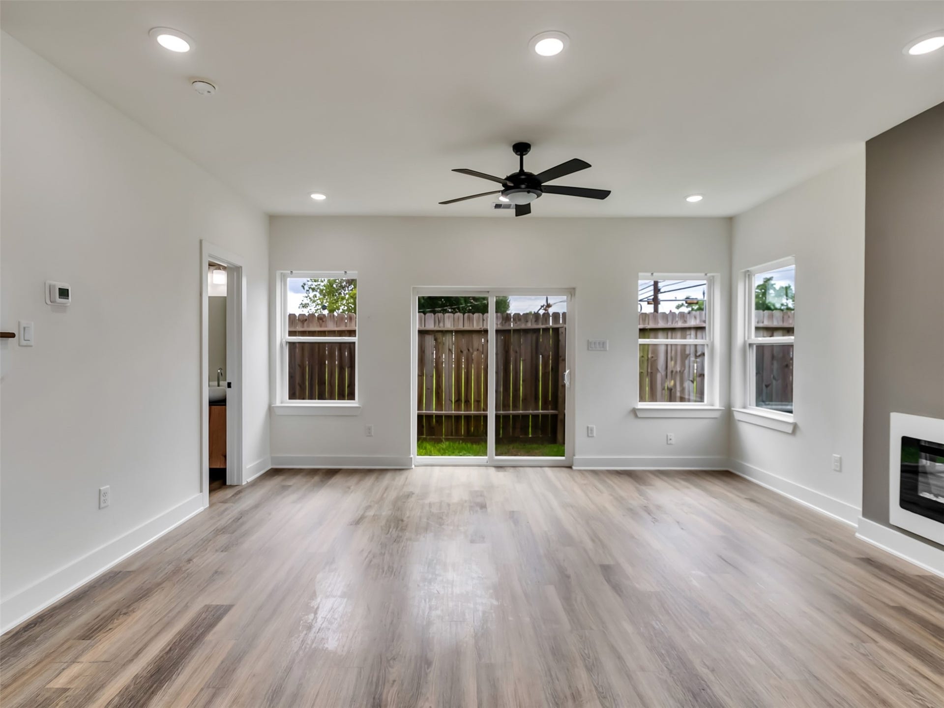 855 S Victory Drive, #C, Houston, TX 77088 facing sliding glass doors