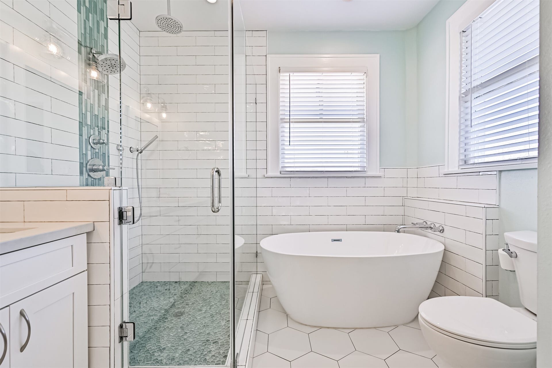 3519 Avenue R 1/2, Galveston, TX 77550 Spa like primary bath with freestanding soaker tub,