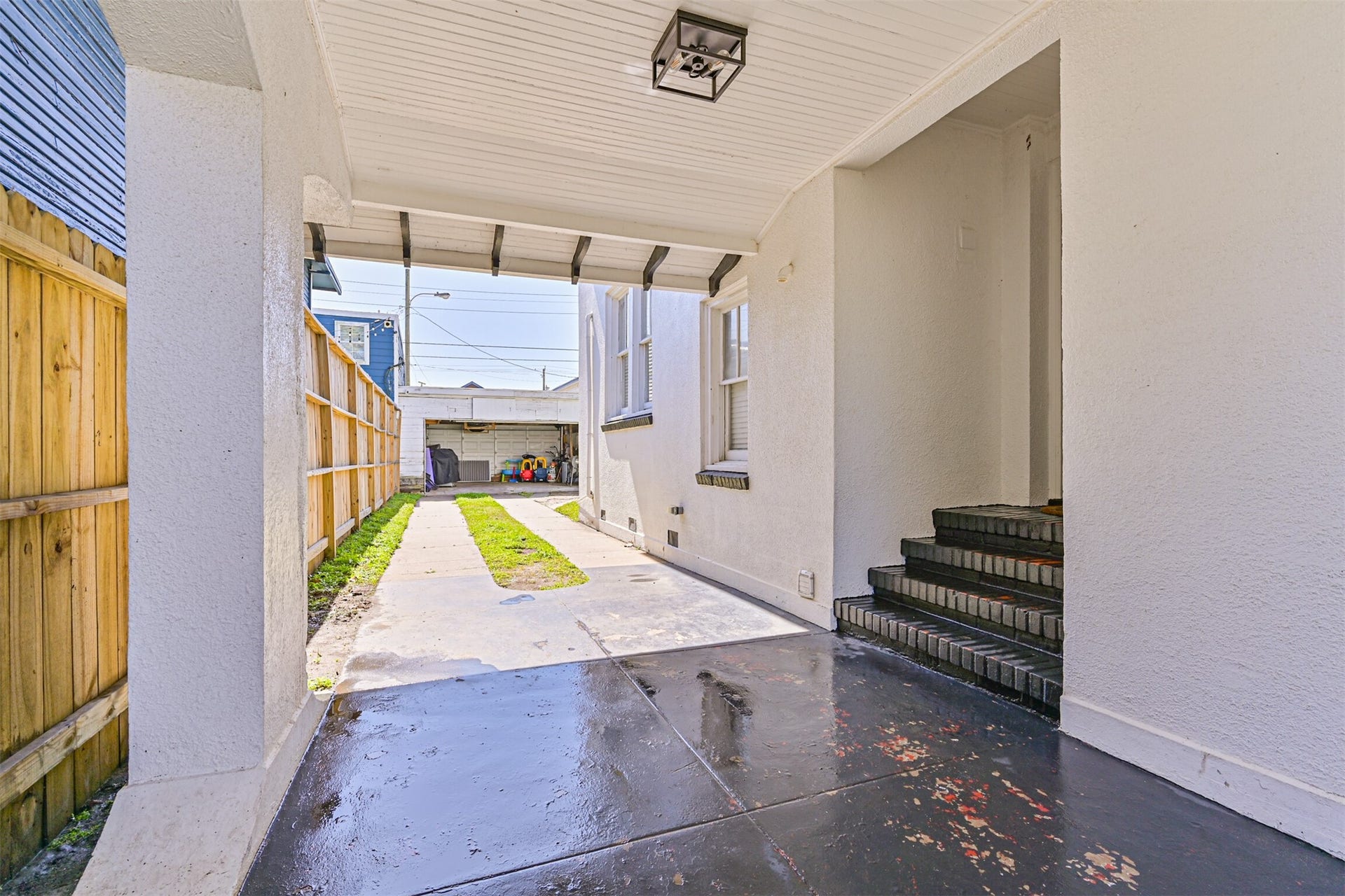 3519 Avenue R 1/2, Galveston, TX 77550 Beautiful, covered carport leading into the home