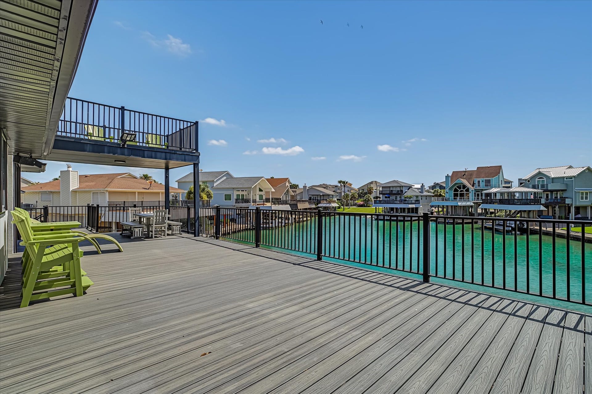1047 & 1027 Long Reach Drive, Tiki Island, TX 77554 Main house upper level patio- sea view