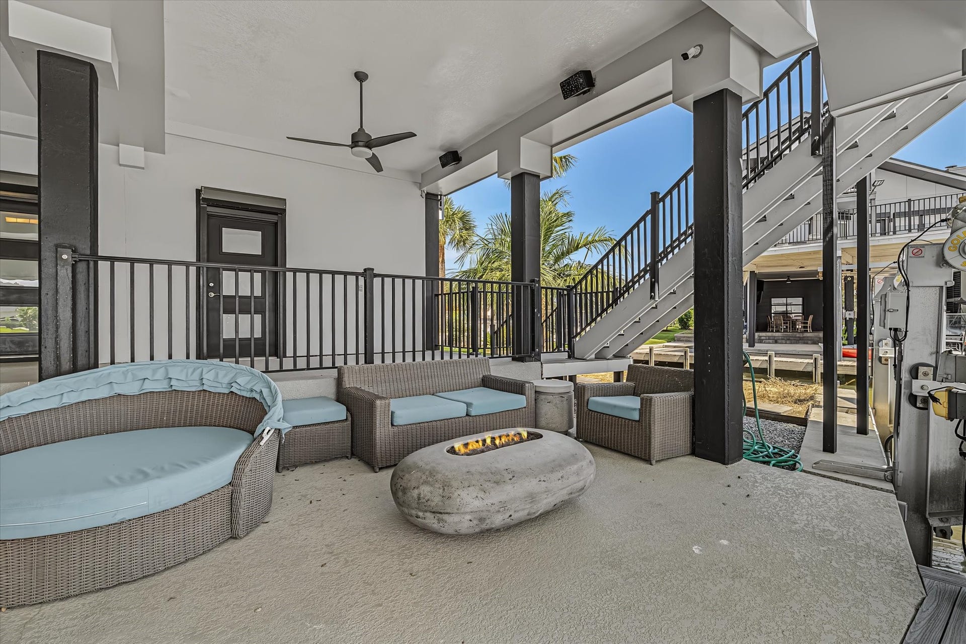 1047 & 1027 Long Reach Drive, Tiki Island, TX 77554 Main house patio-connected path to guest house