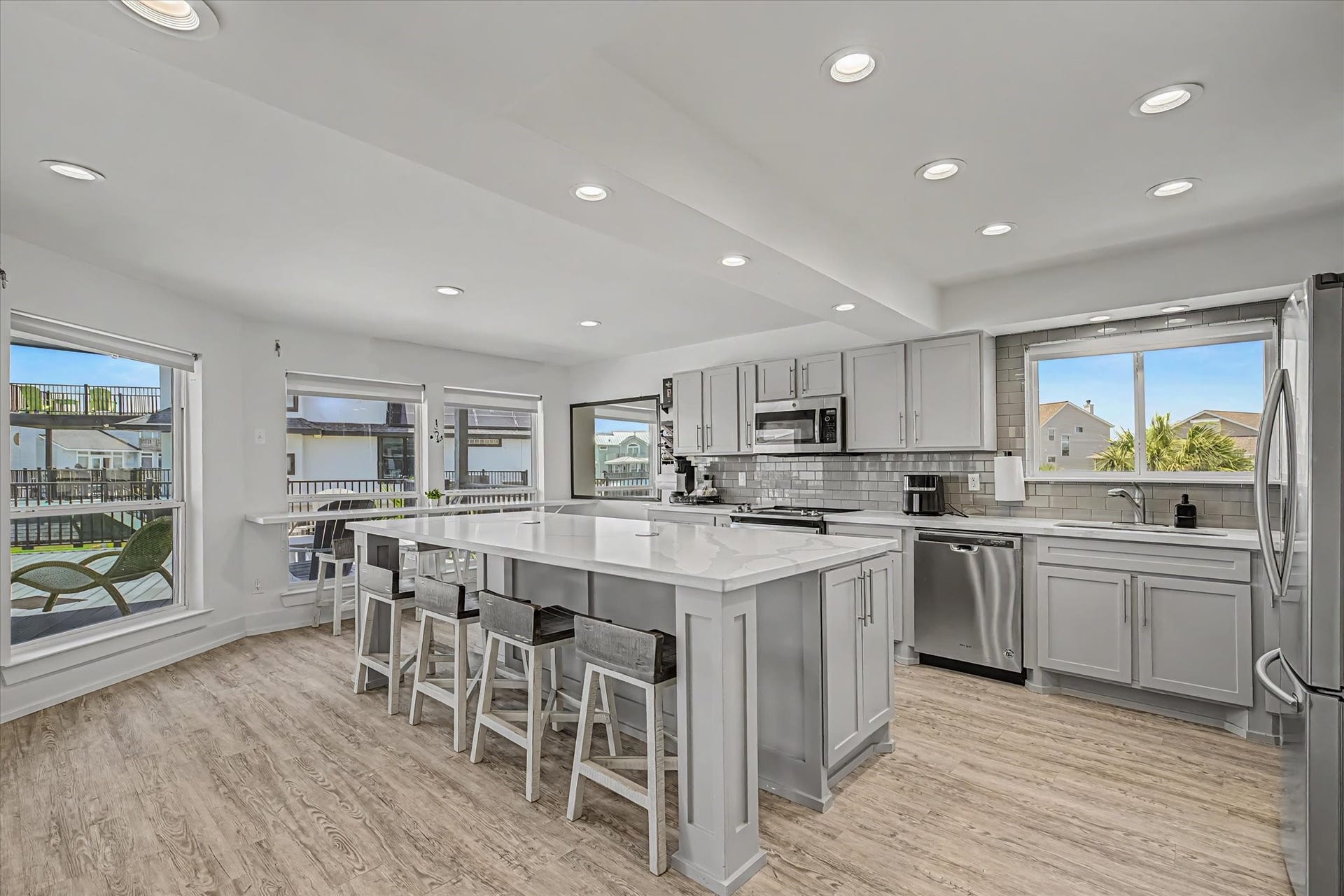1047 & 1027 Long Reach Drive, Tiki Island, TX 77554 Kitchen island and bar in Guest house- facing sea view