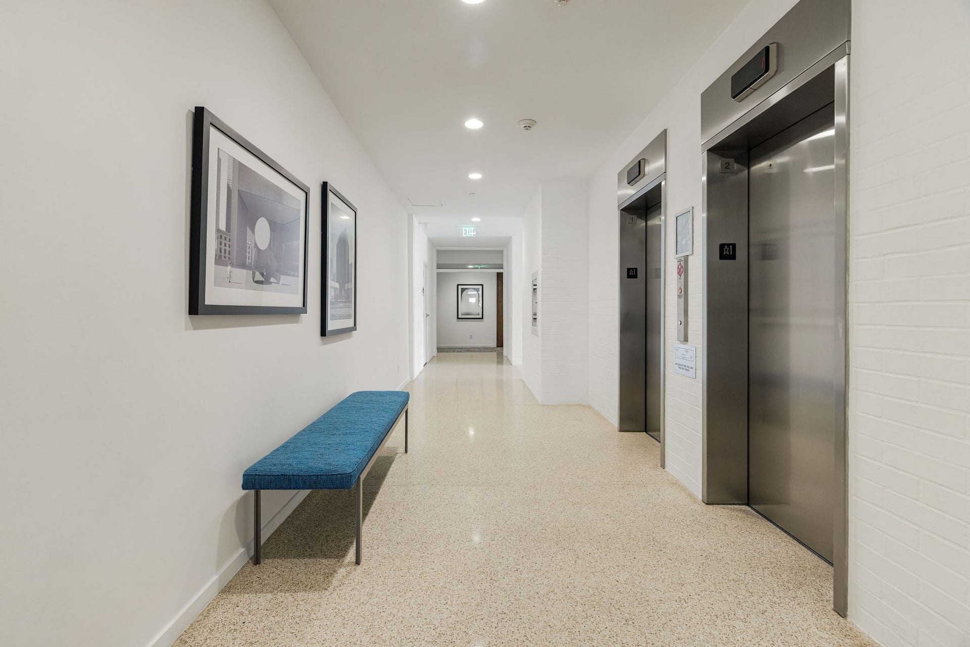 3600 Montrose Boulevard, #501, Houston, TX 77006 This 1965 building has been well maintained. You have a modern feel with sleek elevators, stylish artwork, and a comfortable bench, offering a welcoming entrance to the building.