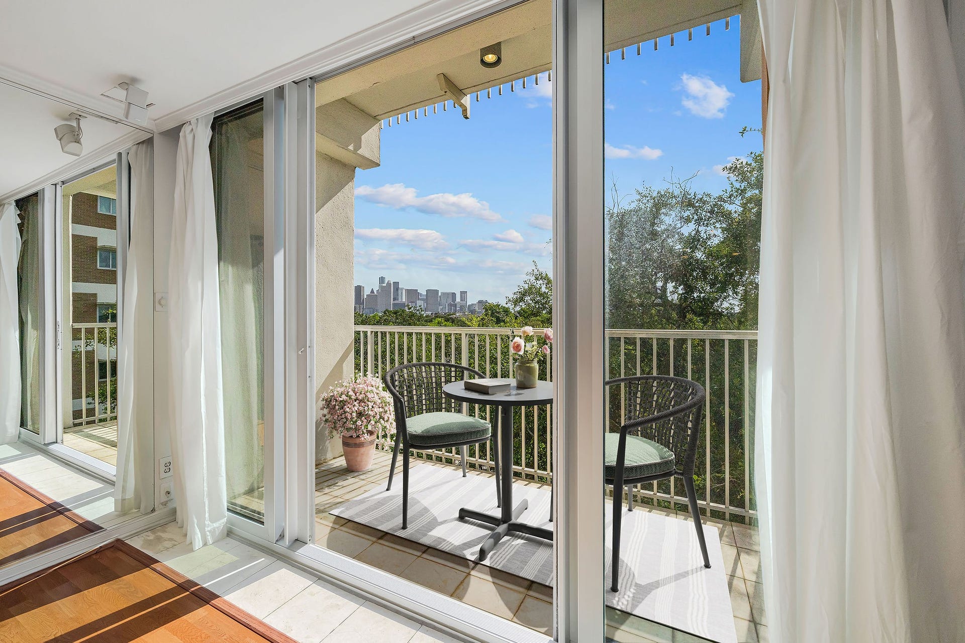 3600 Montrose Boulevard, #501, Houston, TX 77006 Enjoy stunning city views from this bright, airy balcony, perfect for relaxing with a morning coffee.