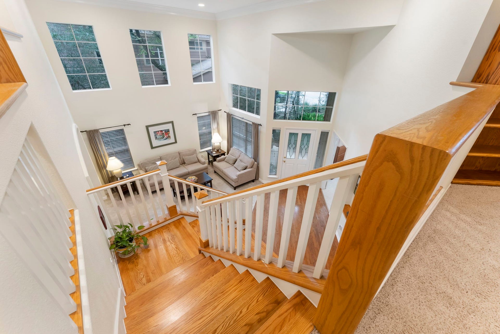 74 E Greywing Circle, The Woodlands, TX 77382 View from upstairs looking down to entry and living room