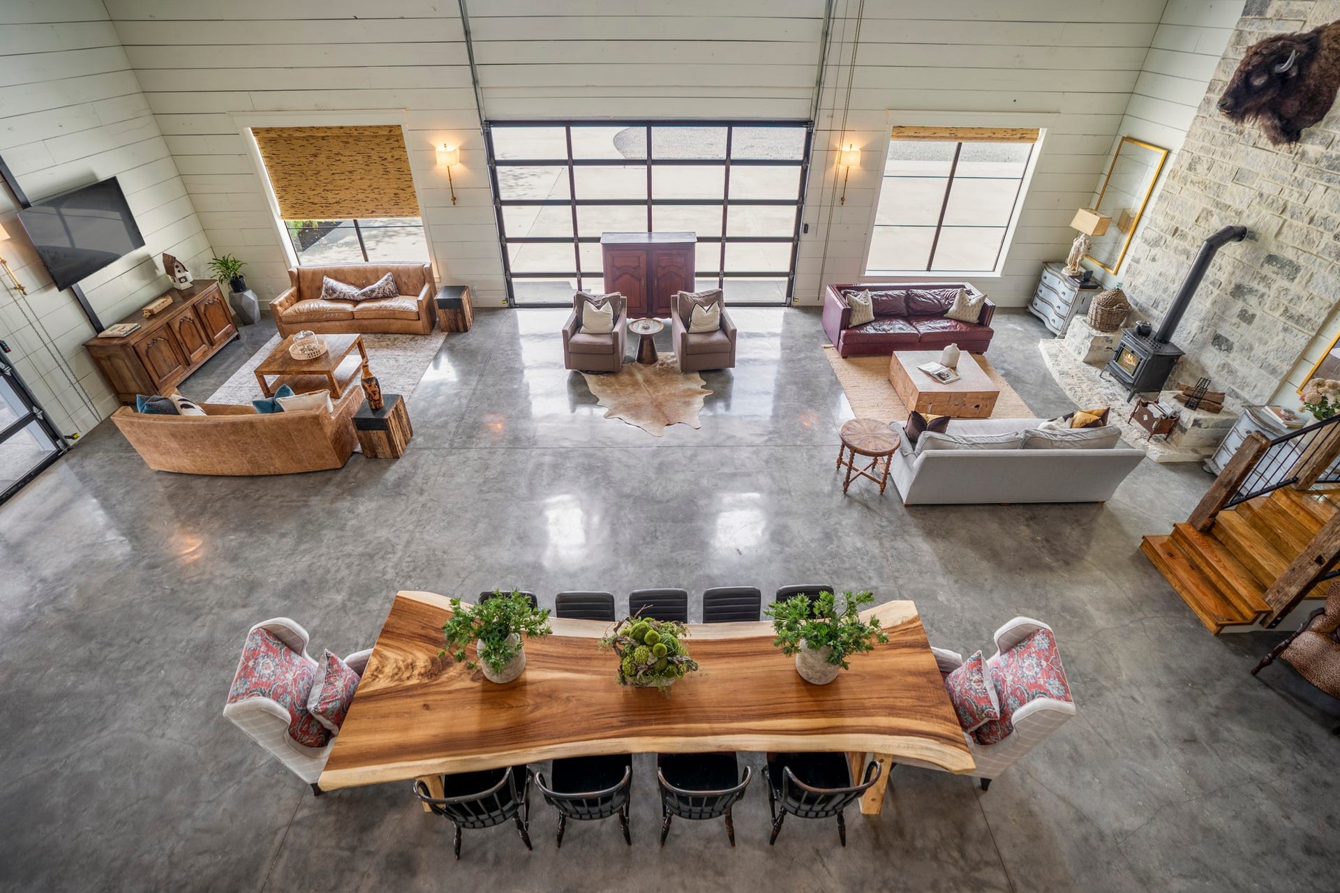Dramatic aerial view of open-concept living areas.