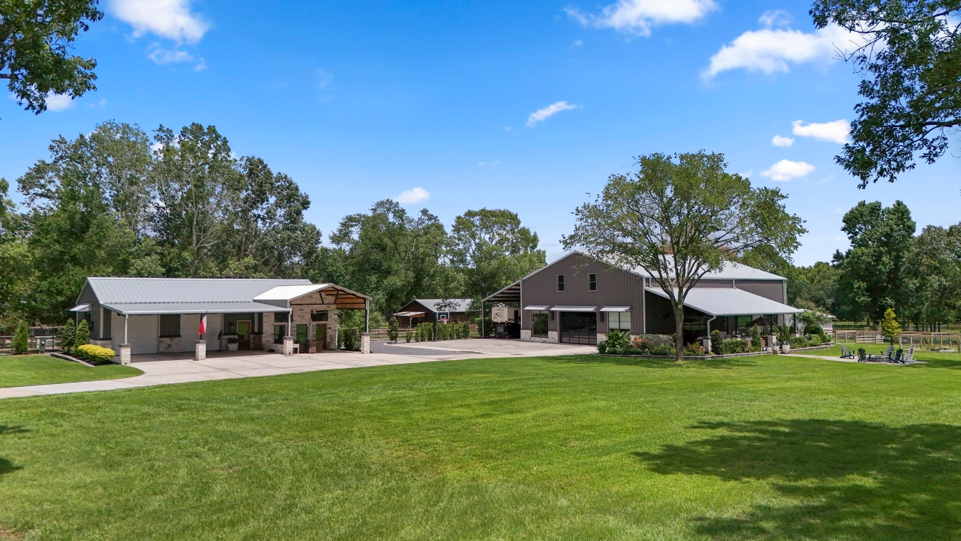 Engineered for efficiency with underground drainage flowing to the back pasture, plus a fully enclosed 400-foot water well complete with water softener system and dedicated storage. Over 35 irrigation zones keep the landscaping, lawn, garden areas and grounds beautifully maintained with extensive automated sprinkler coverage.