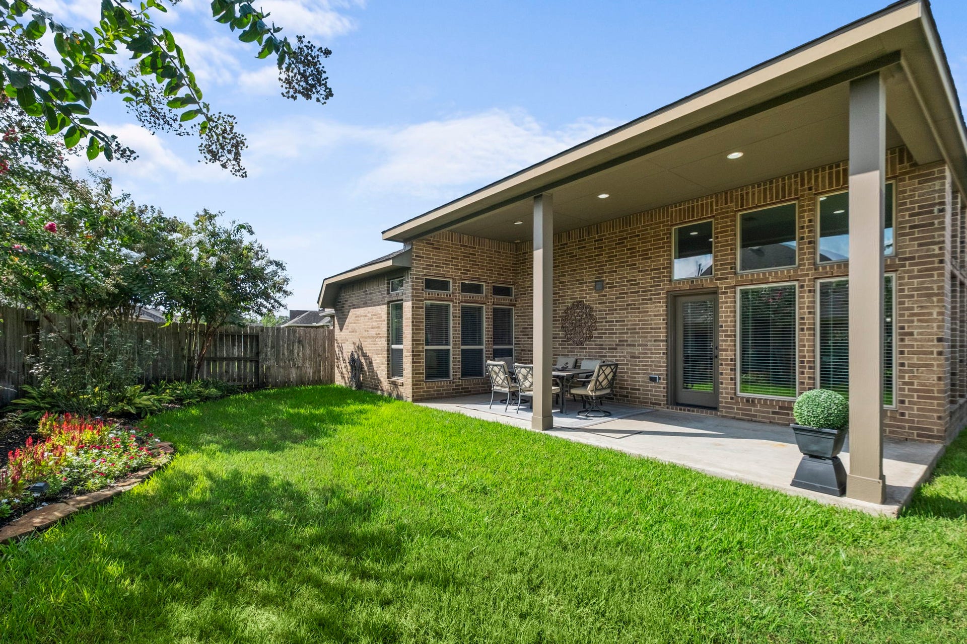 2030 Rainy Mist Drive, Missouri City, TX 77459 Generous backyard offers plenty of green space for recreation, pets, or future outdoor enhancements.