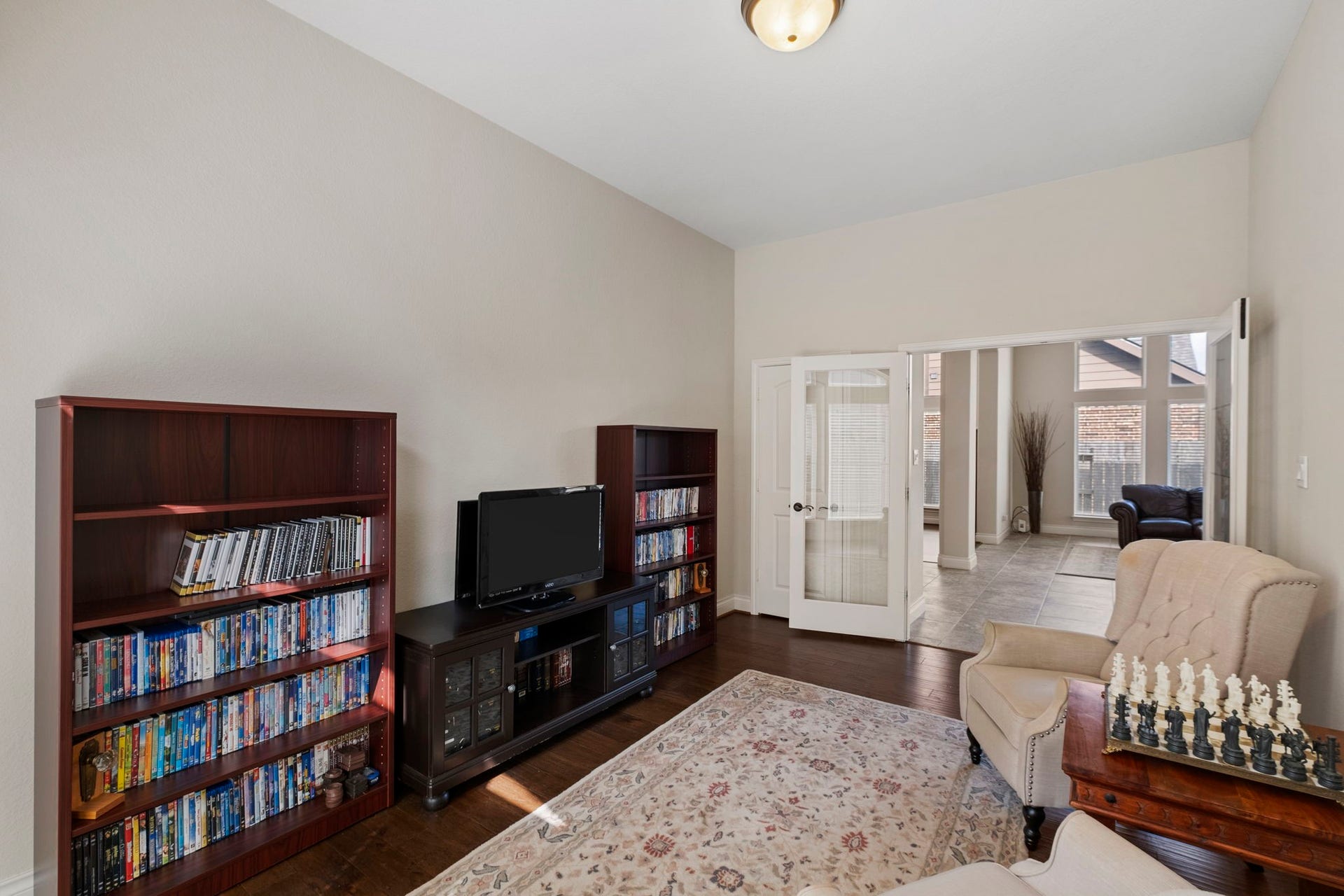 2030 Rainy Mist Drive, Missouri City, TX 77459 Bright area with wood flooring offers flexibility for a game room, lounge, or additional living space.