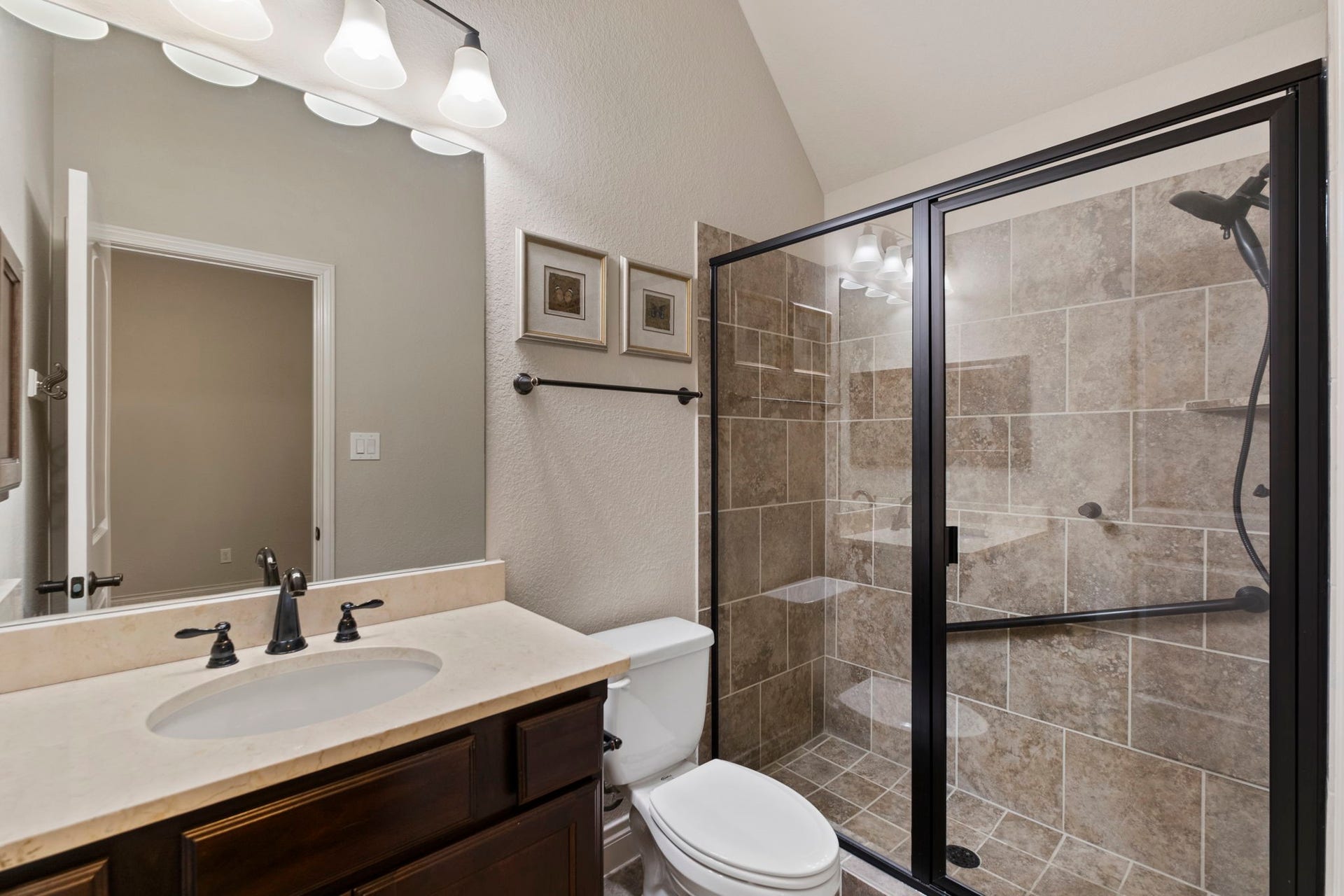 2030 Rainy Mist Drive, Missouri City, TX 77459 En-suite bathroom features a spacious vanity and glass-enclosed shower.