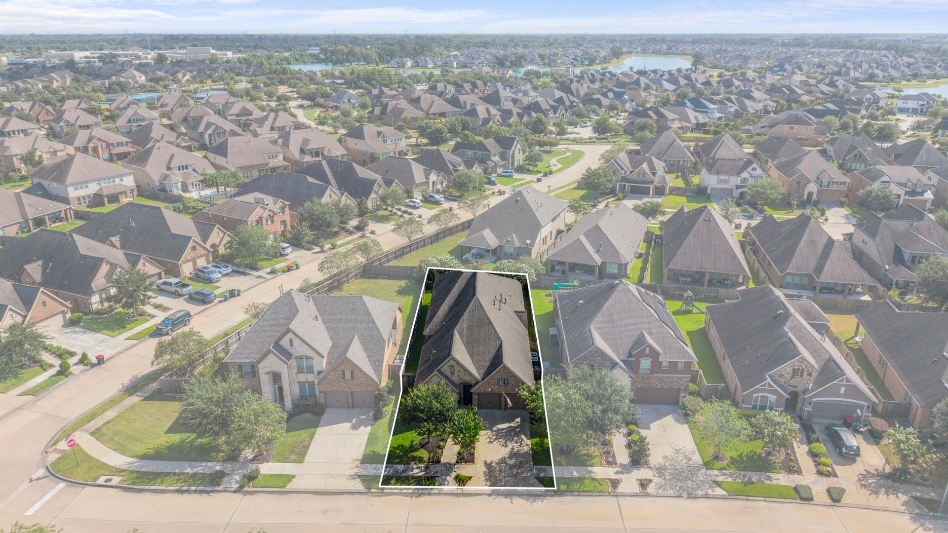 2030 Rainy Mist Drive, Missouri City, TX 77459 Aerial view showcasing the homes location within the established Sienna community.