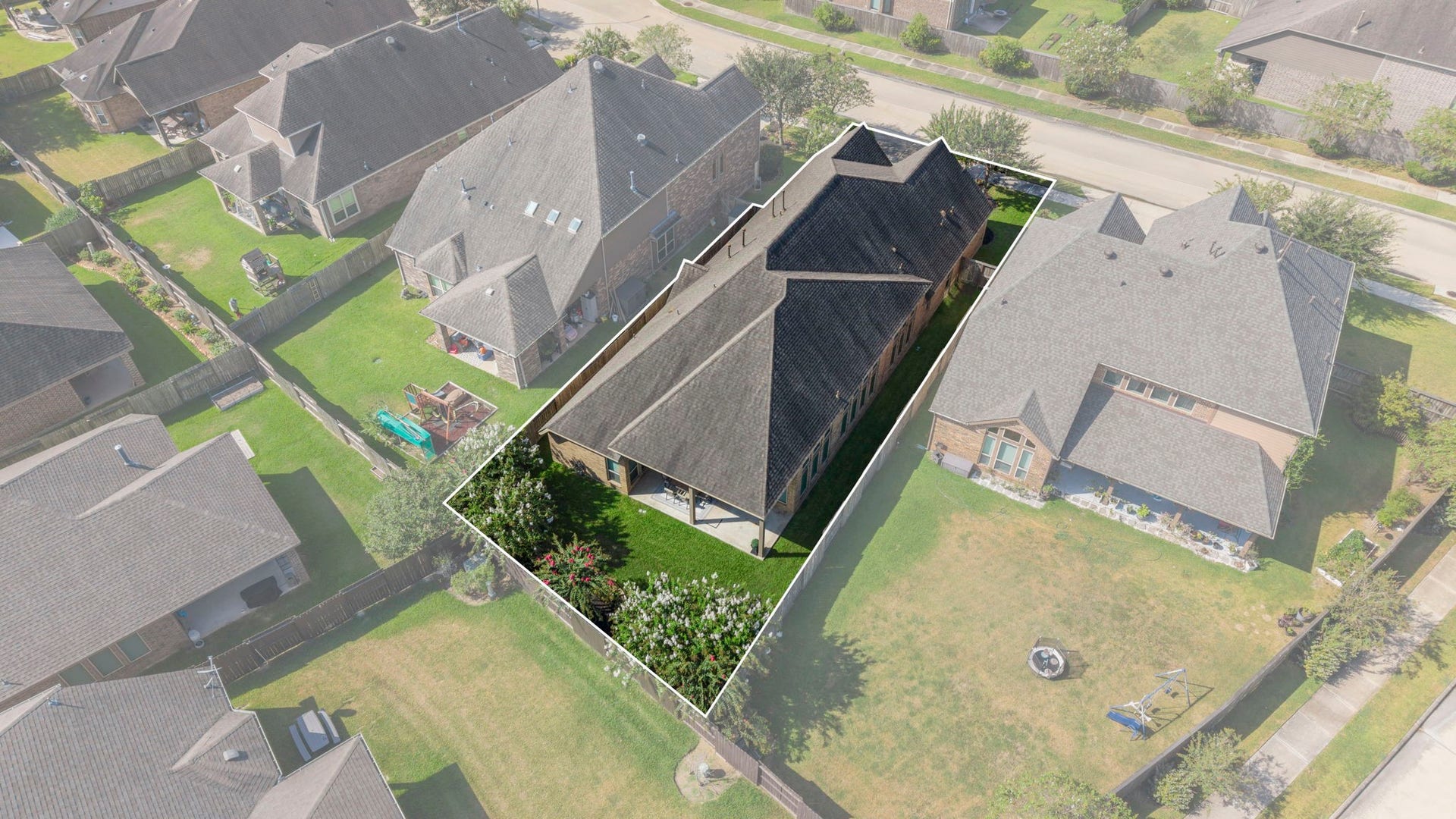 2030 Rainy Mist Drive, Missouri City, TX 77459 Elevated view highlights the homes spacious lot and surrounding neighborhood.