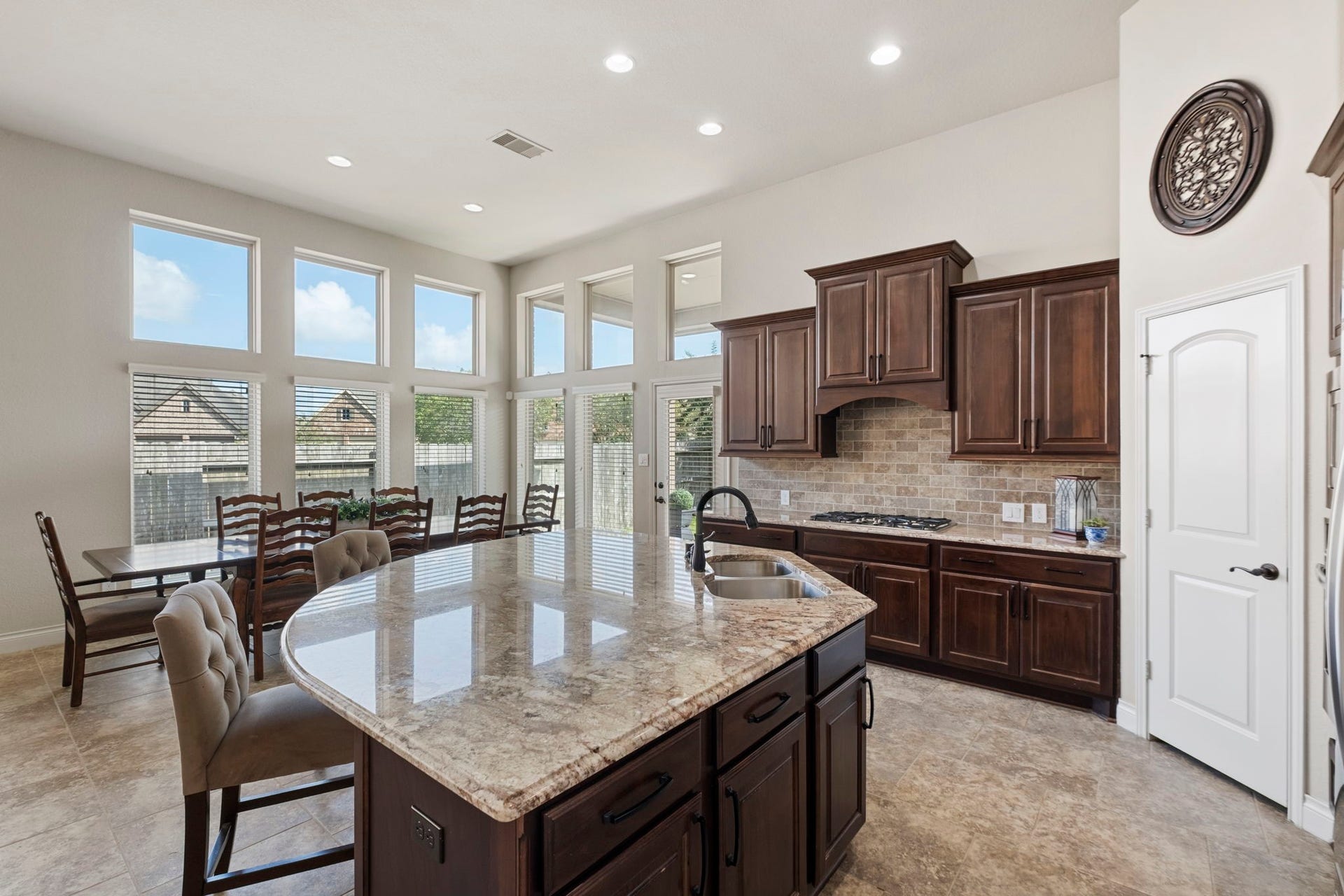 2030 Rainy Mist Drive, Missouri City, TX 77459 Generous counter space and abundant cabinetry provide plenty of room for cooking and storage.