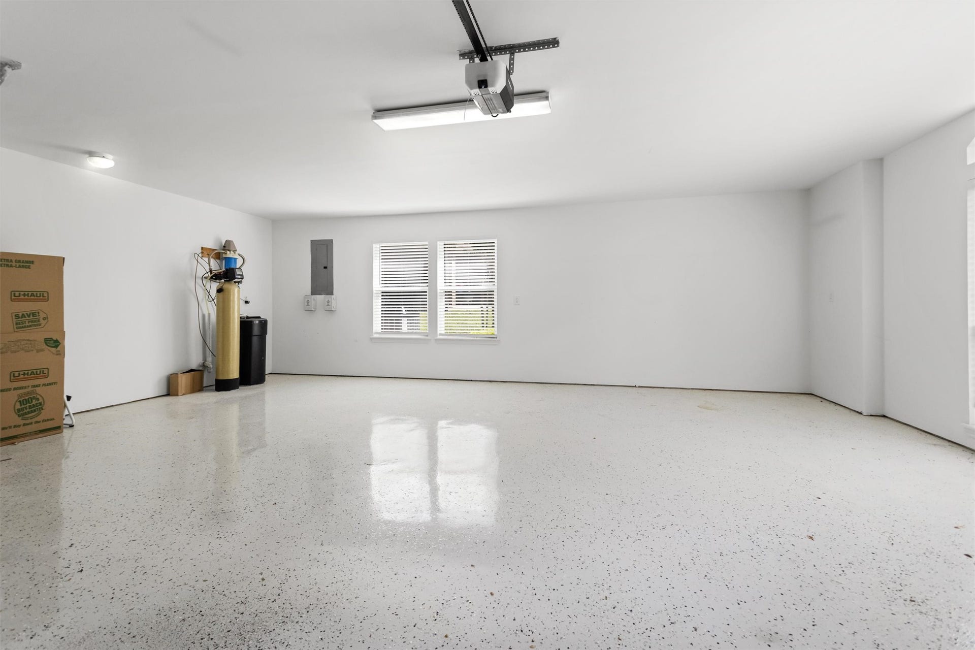 13 Royal Dalton Circle, Conroe, TX 77304 Check out this huge two-car garage! Its got fresh epoxied floors, new insulated doors, and a new opener, so theres plenty of room for your cars and gear. Plus, youve got a water softener and the sprinkler system controls all tucked away in here.