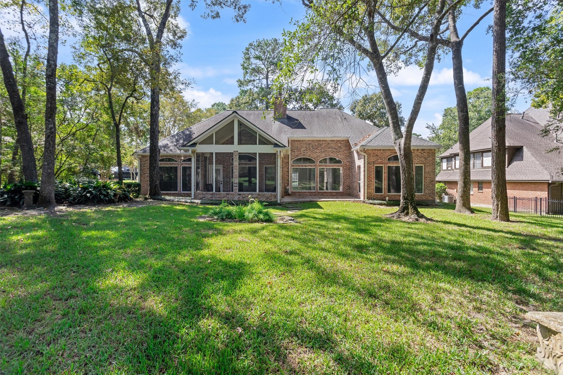 13 Royal Dalton Circle, Conroe, TX 77304 This home is just as charming from the backyard as it is from the front. Situated on a spacious 1/3 acre lot with no back neighbors, this property is a rare finddont miss your chance to see it!