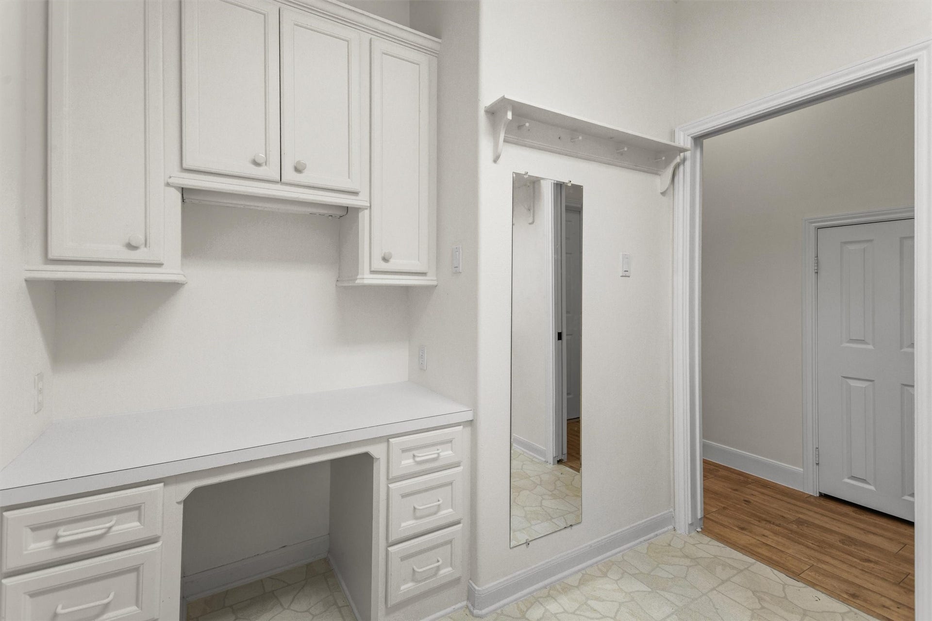 13 Royal Dalton Circle, Conroe, TX 77304 You'll love the huge laundry room with tons of space for folding, plus there's a handy built-in desk that's perfect for tackling projects or getting some paperwork done.