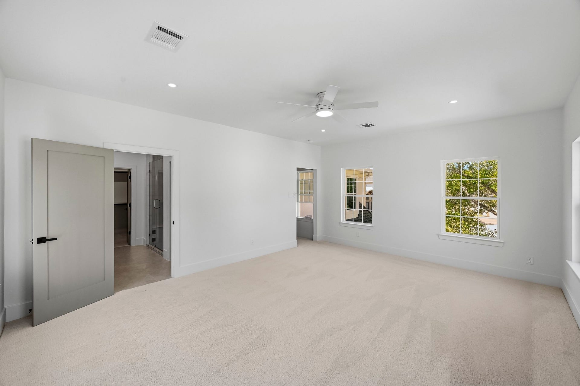 The room offers plenty of space for a sitting area or desk!