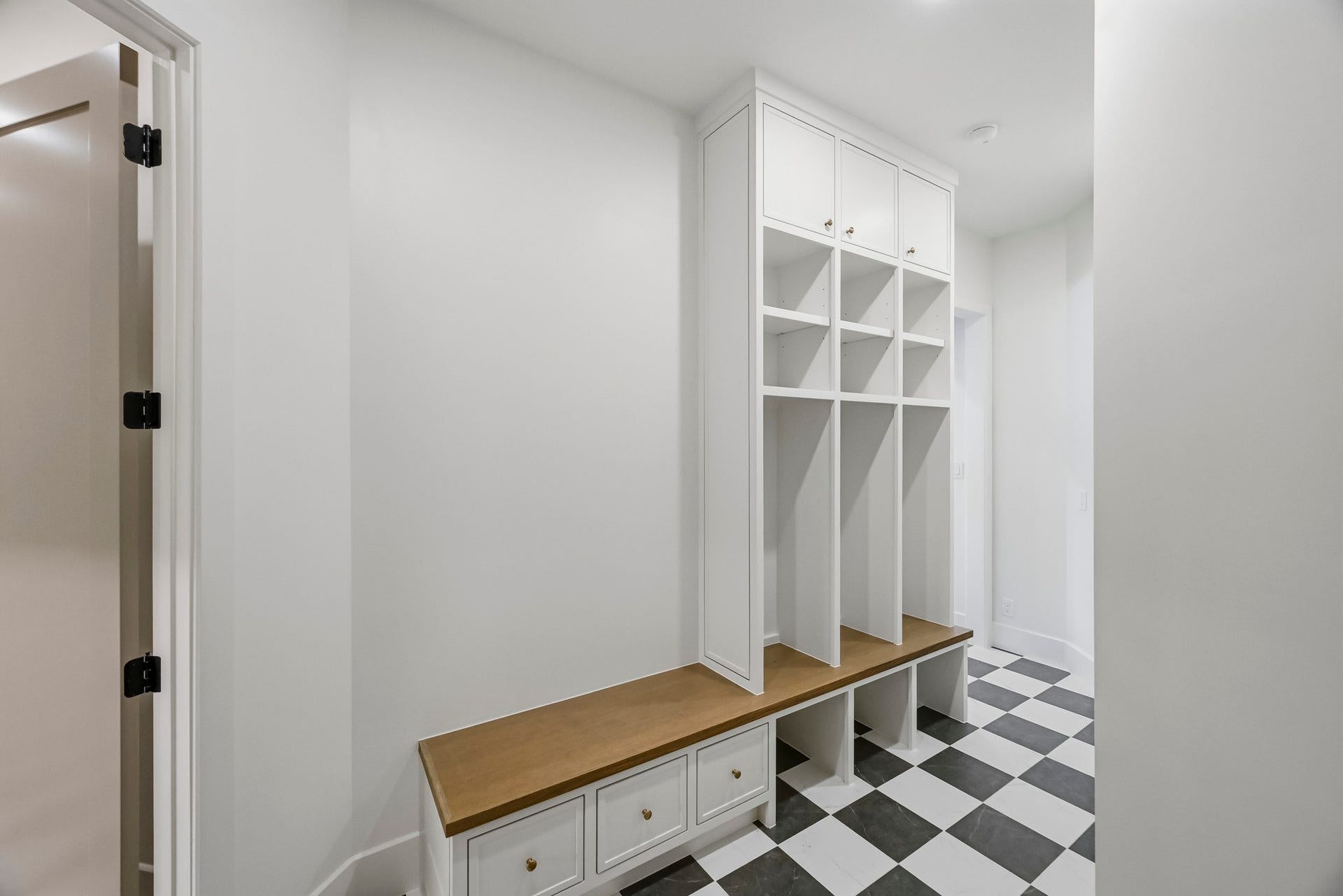 Just in from the 3-car garage is the well-appointed mudroom!