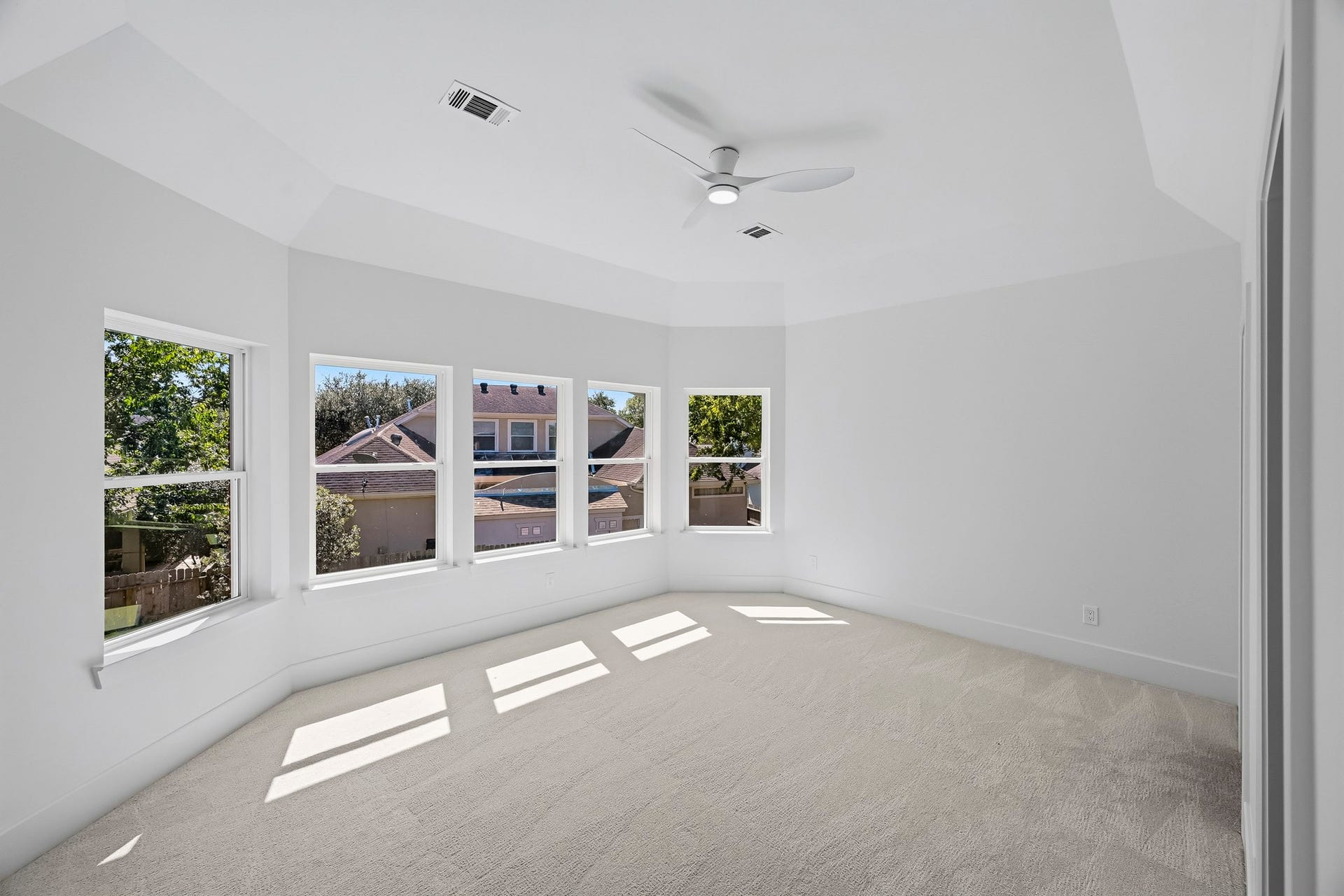 The second guest suite provides an expansive view of the backyard!