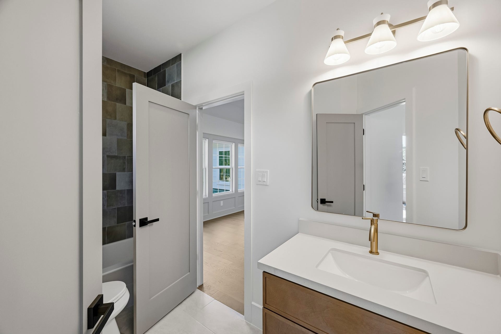 The ensuite bath is also accessible from the game room!