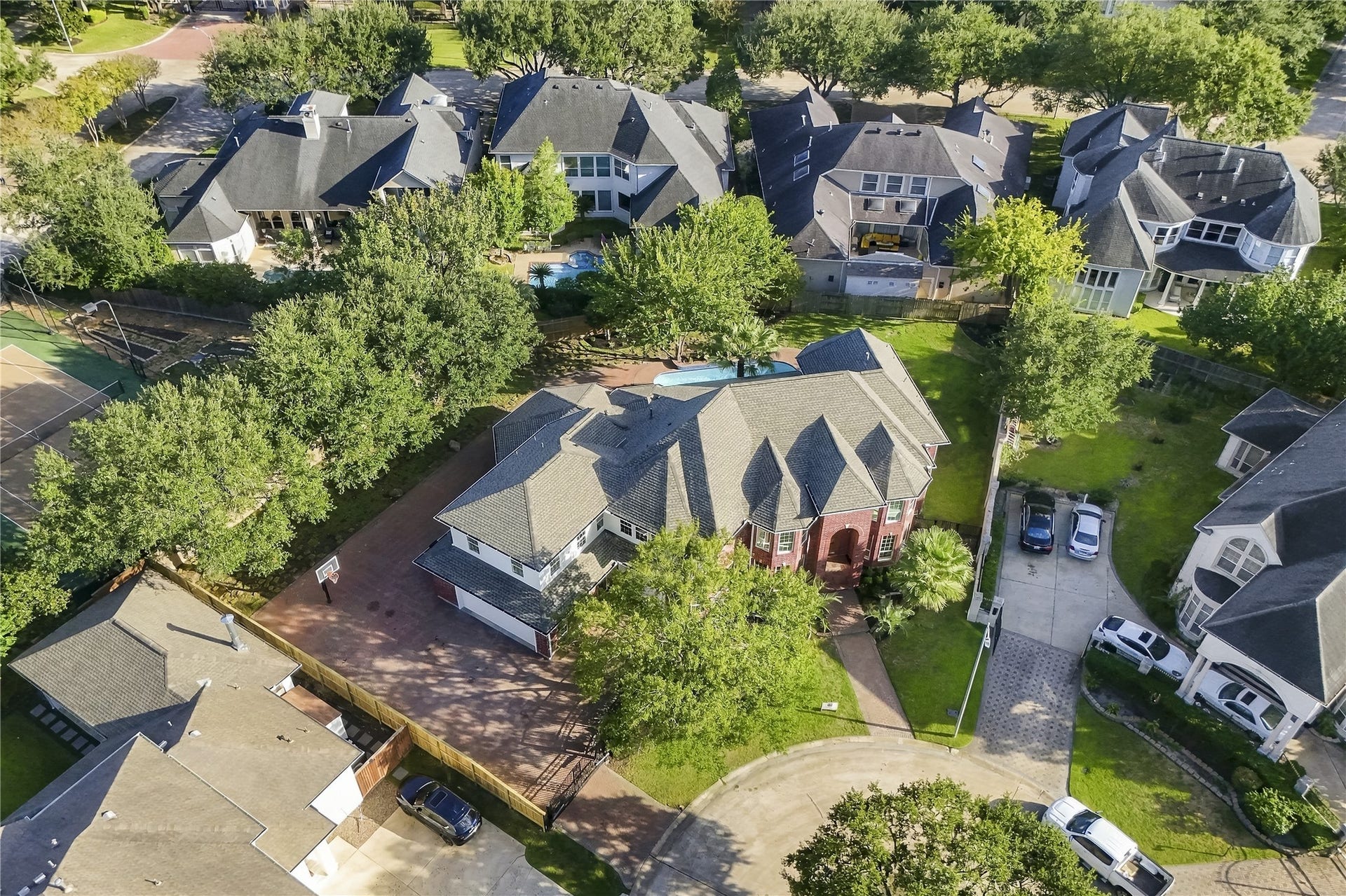 Oversized cul-de-sac lot with spectacular parking and yard!