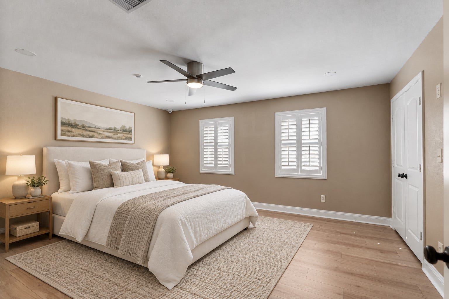 8619 La Fonte Street, Houston, TX 77024 This spacious upstairs secondary bedroom #1 features light wood-look tile flooring, recessed lighting and a modern ceiling fan. Two windows with plantation shutters bring in natural light, while a double-door closet provides additional storage. The room also includes access to its own ensuite bathroom. **NOTE: this photo has been virtually staged.