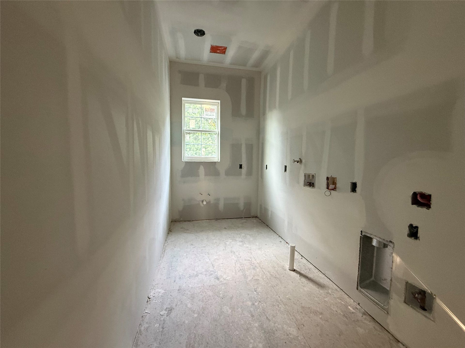 1021 Nadine Street, Houston, TX 77009 Utility room will feature built in clothes hamper (custom cabinetry) and include a sink.