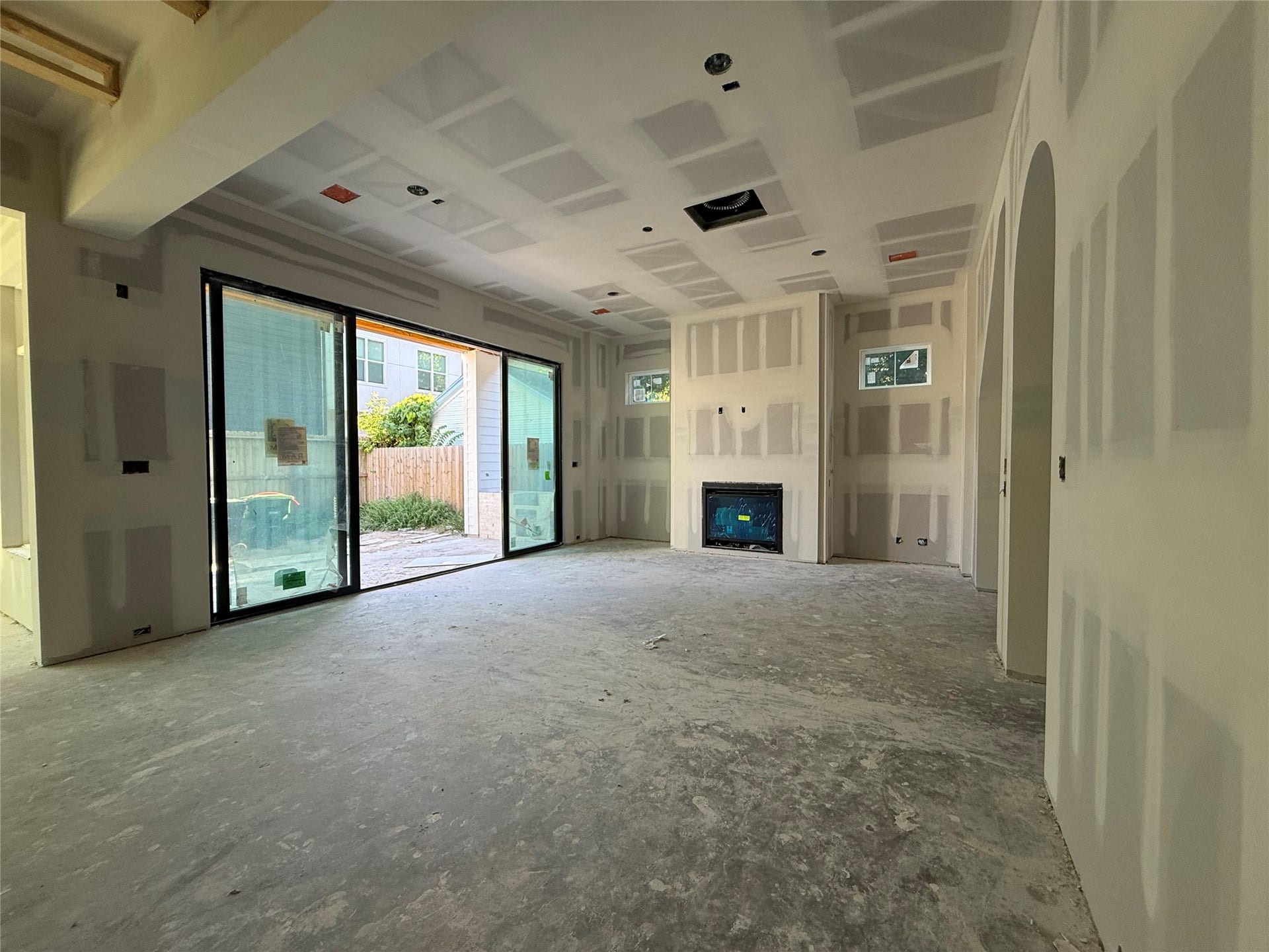 1021 Nadine Street, Houston, TX 77009 Massive 16' wide biparting sliding door opens to a covered outdoor patio