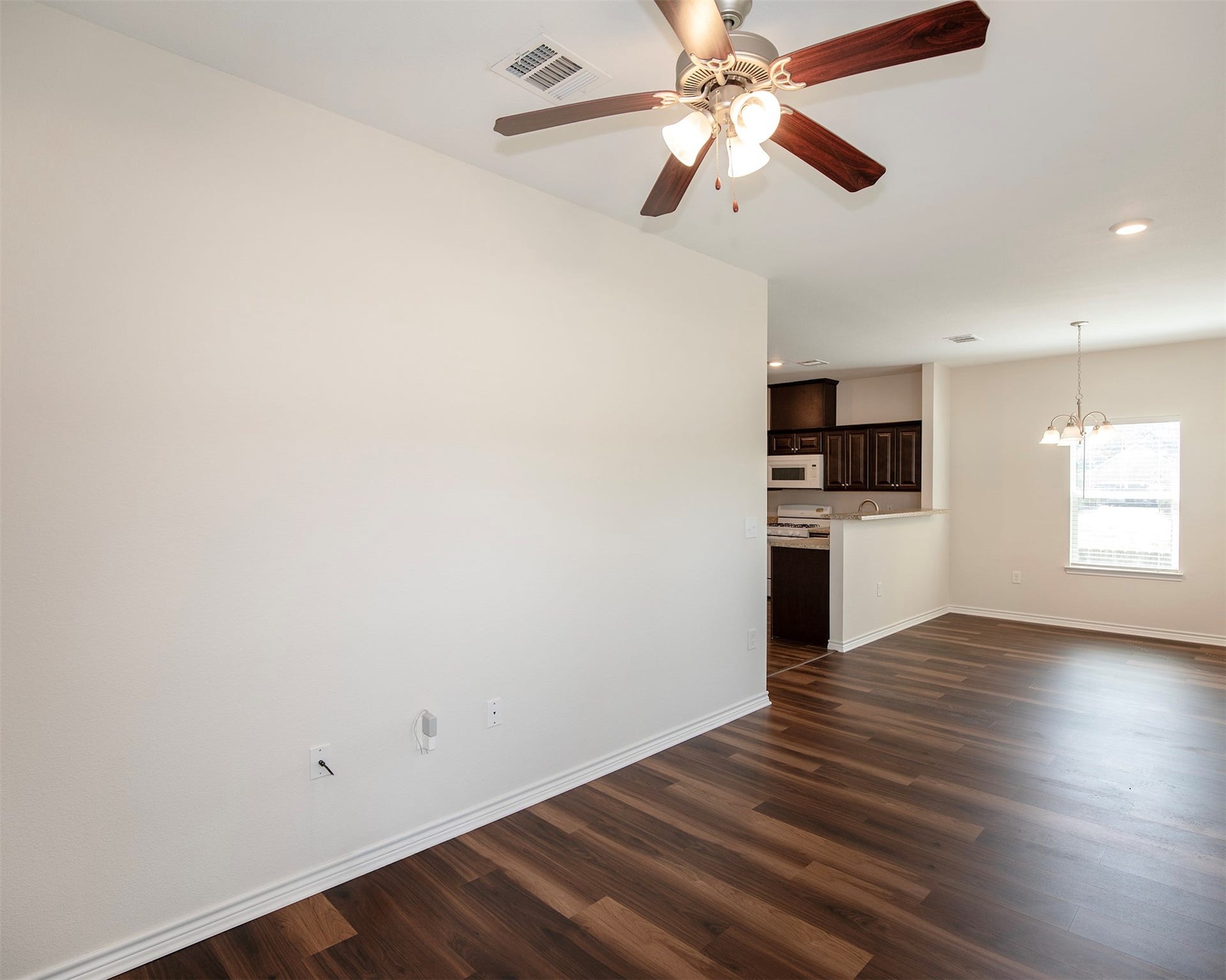 The family room seamlessly connects to the dining area and kitchen.
