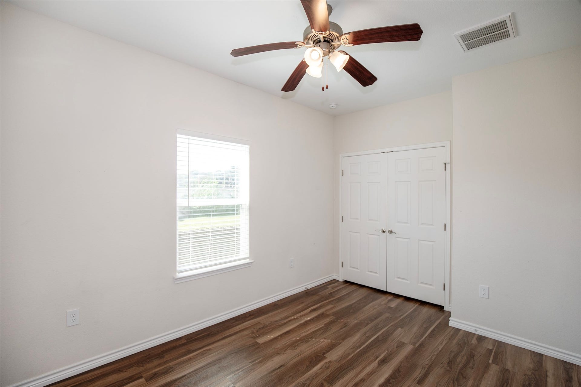 The secondary bedroom has great closet space.