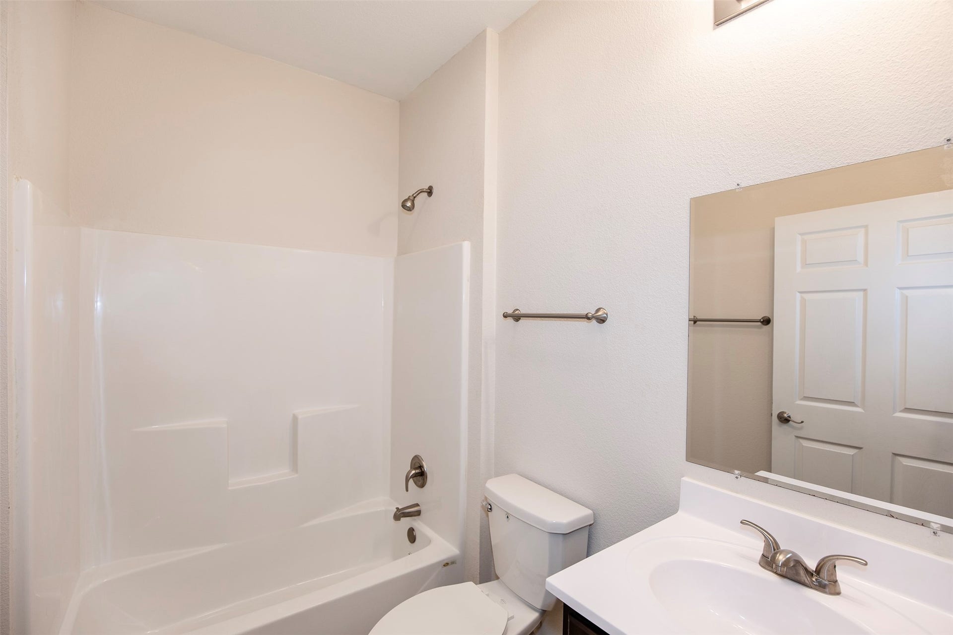 The guest bathroom has terrific space.