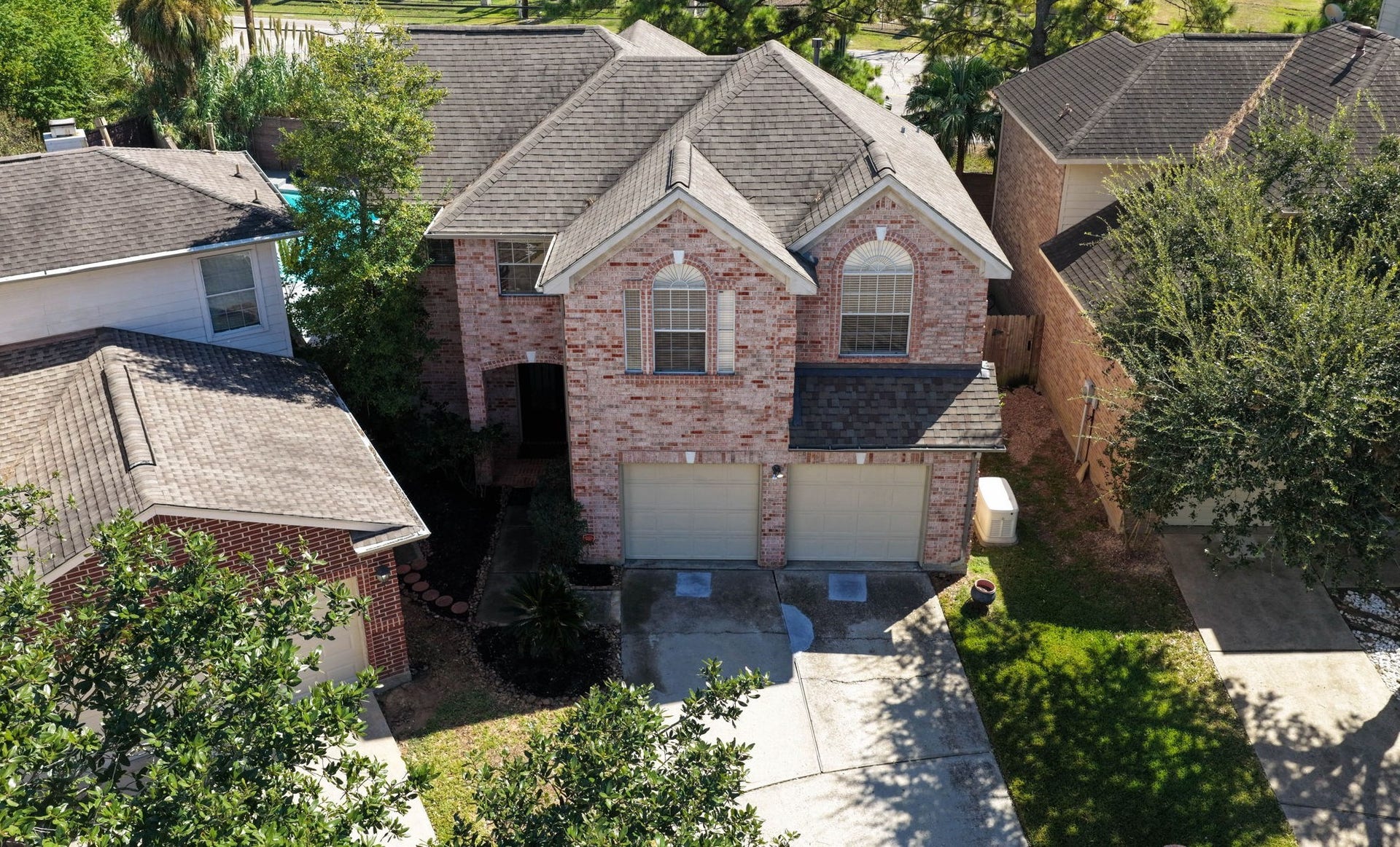 18302 Rittenhouse Park Court, Spring, TX 77379 Full view of this 3 bedroom, 2.5 bath home located on a cul-de-sac lot.