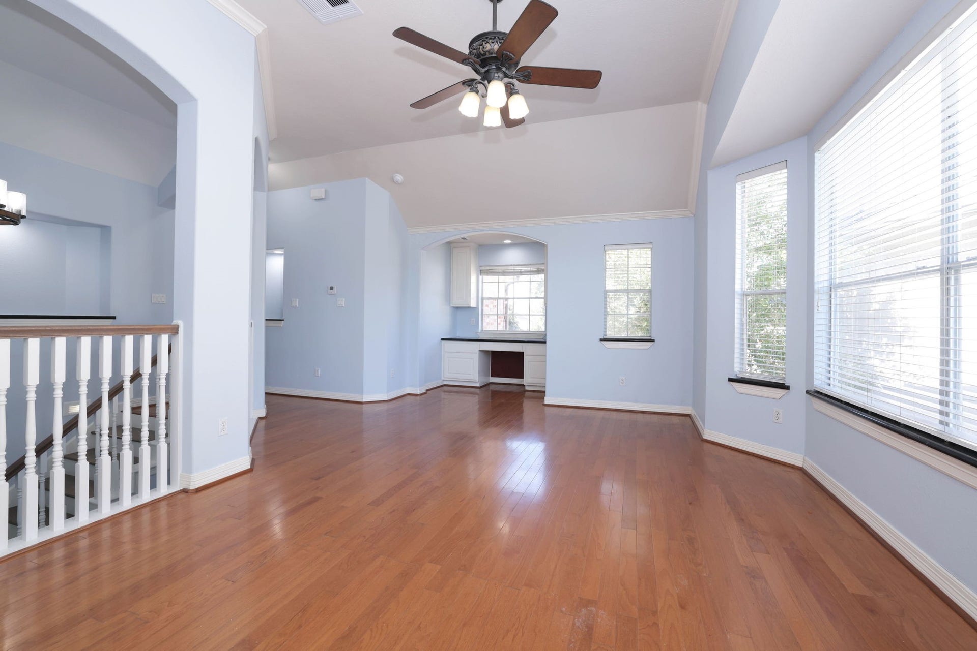18302 Rittenhouse Park Court, Spring, TX 77379 The spacious game room continues with wood floors and granite window sills.