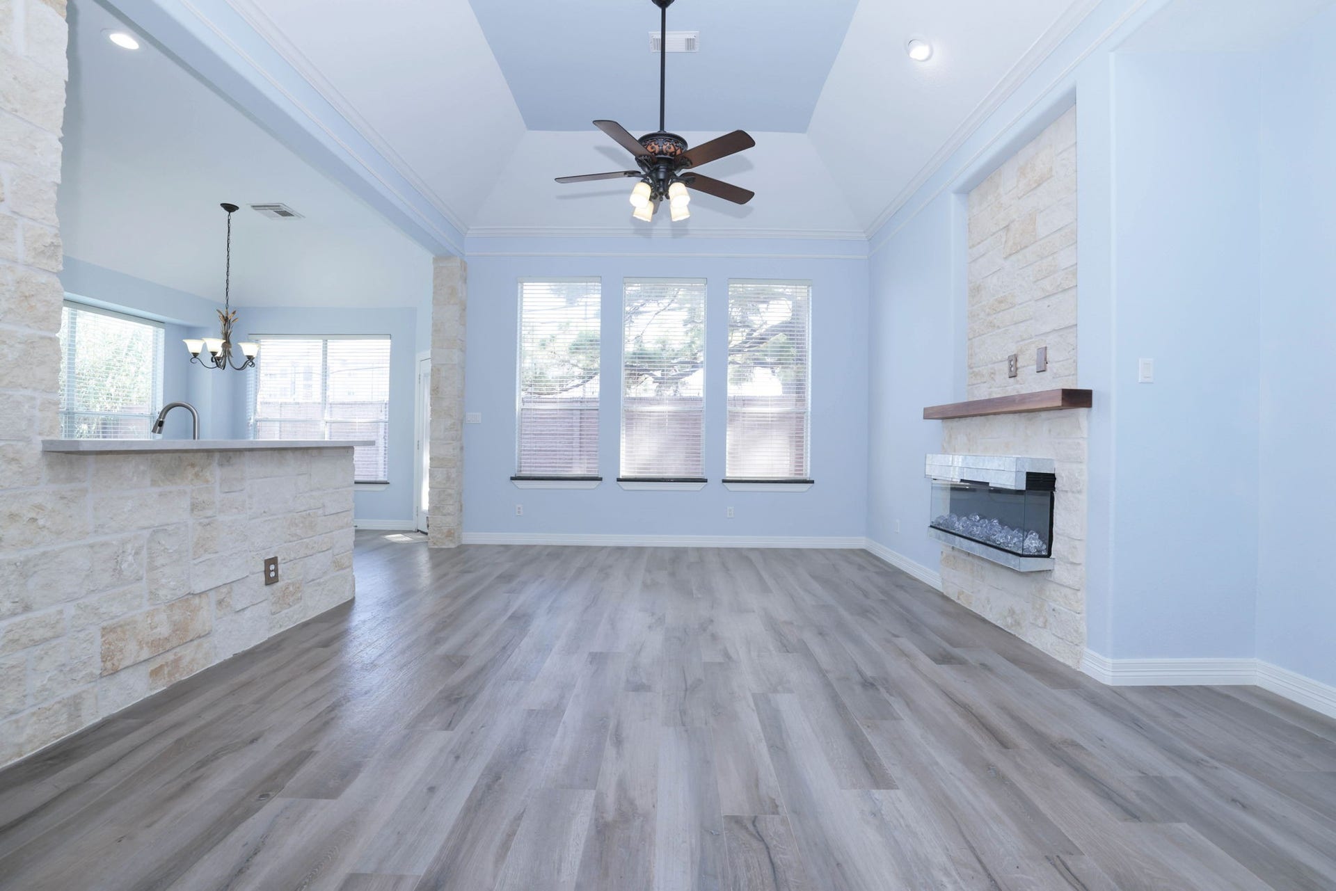 18302 Rittenhouse Park Court, Spring, TX 77379 This open plans has wood looking tile flooring throughout the entire first floor.