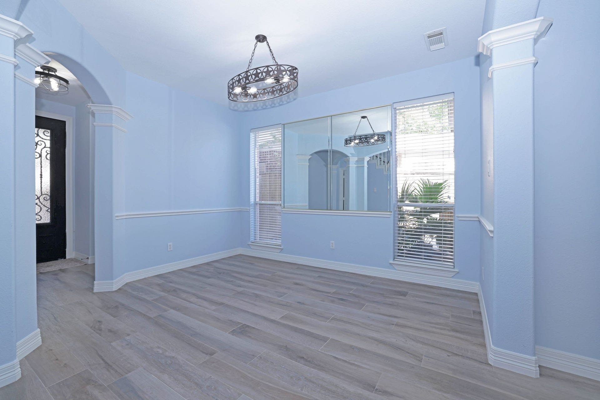 18302 Rittenhouse Park Court, Spring, TX 77379 The formal dining room opens to the family room.